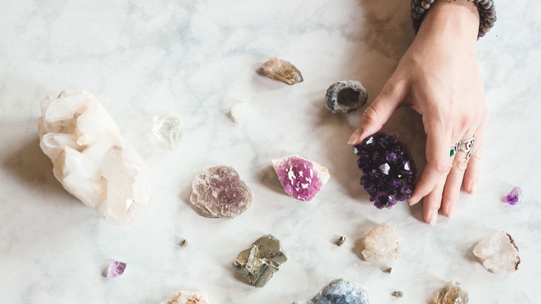 crystals for new beginnings with amethyst, clear quartz, and healing stones for growth and renewal