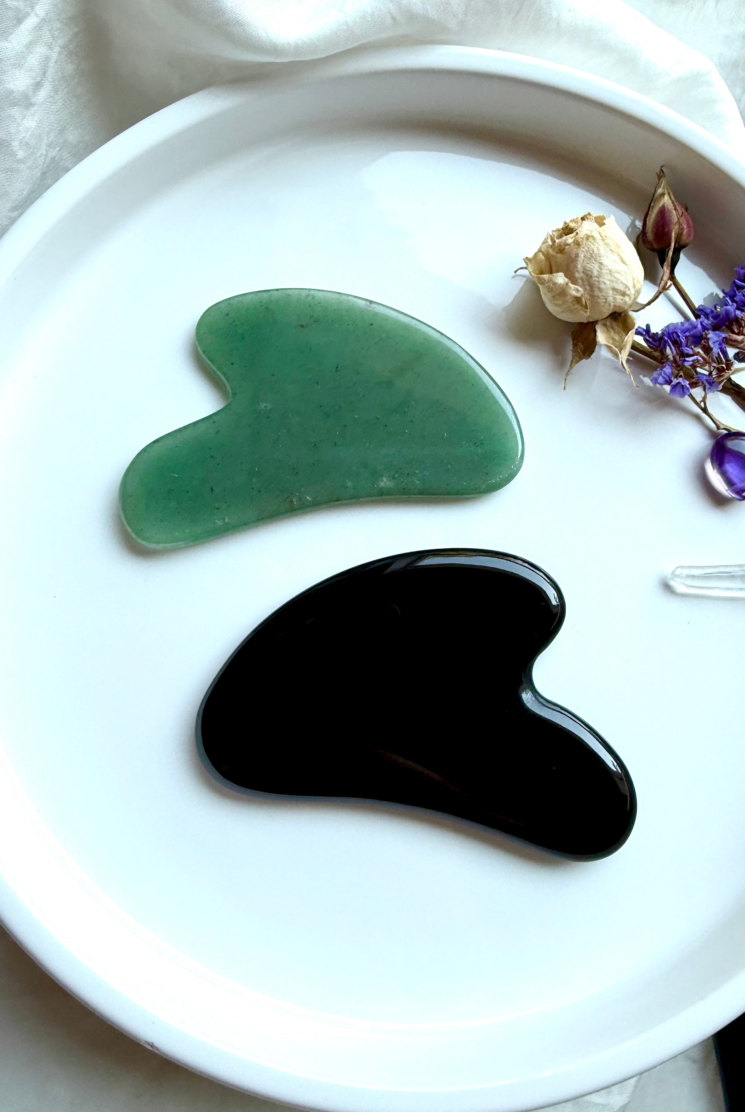 Green Aventurine and Black Obsidian crystal gua sha facial massage tools – curved contour design for skincare, energy healing & beauty rituals