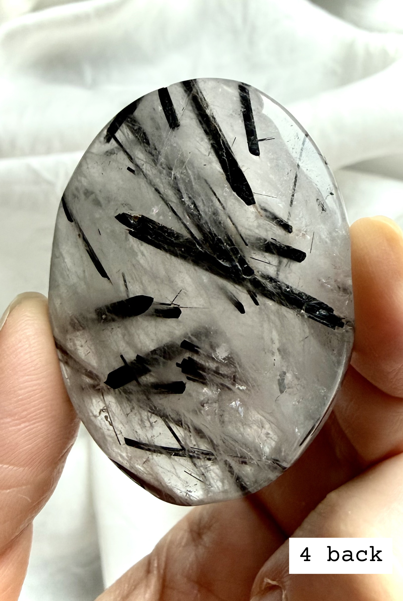 Black Tourmaline in Quartz palm stone 4 back view natural quartz with tourmaline inclusions