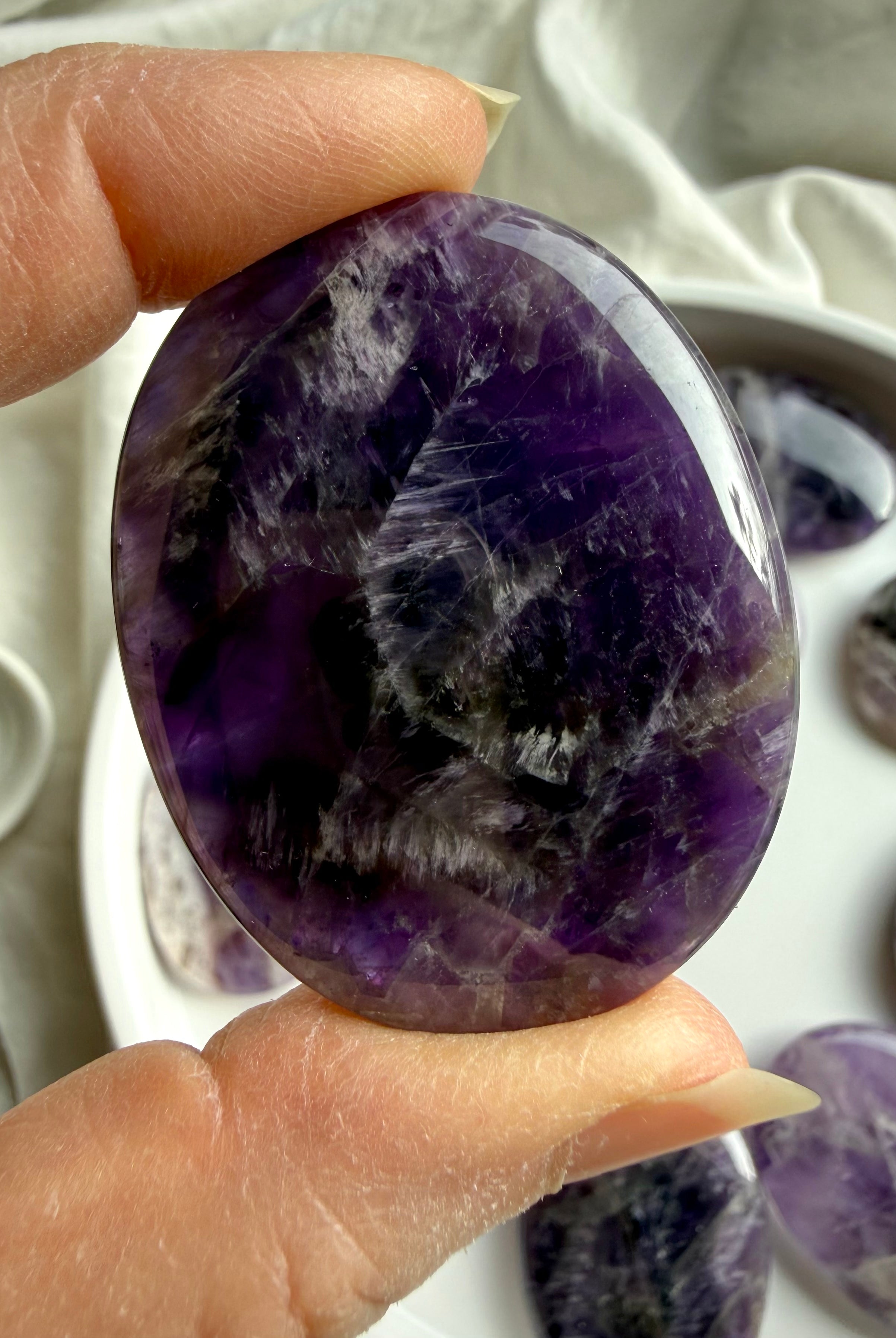 smooth flat purple amethyst palm stone for meditation and daily grounding
