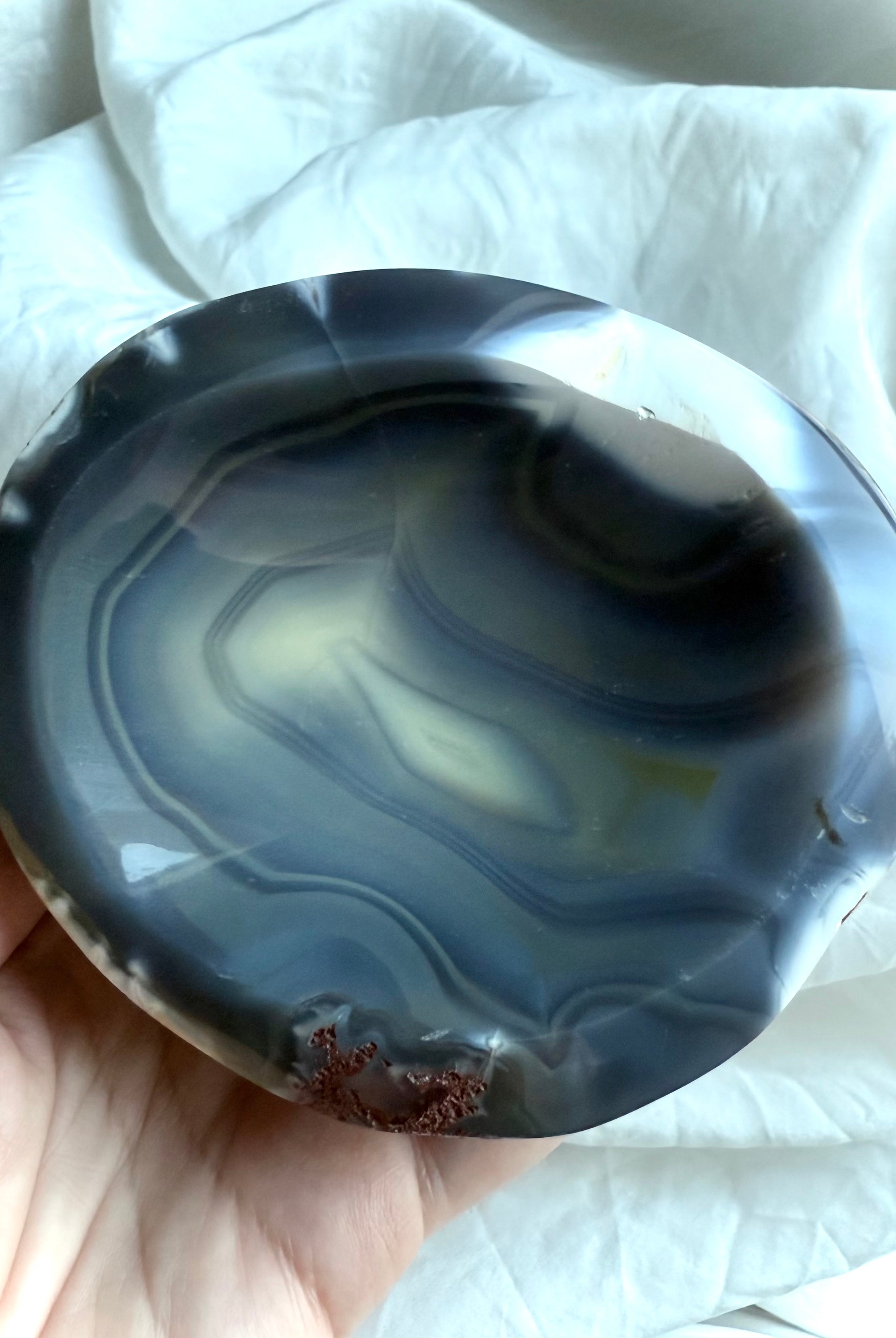 Polished Orca Agate crystal bowl showing natural banded patterns and subtle druzy — grounding stone for protection and sacred offerings.