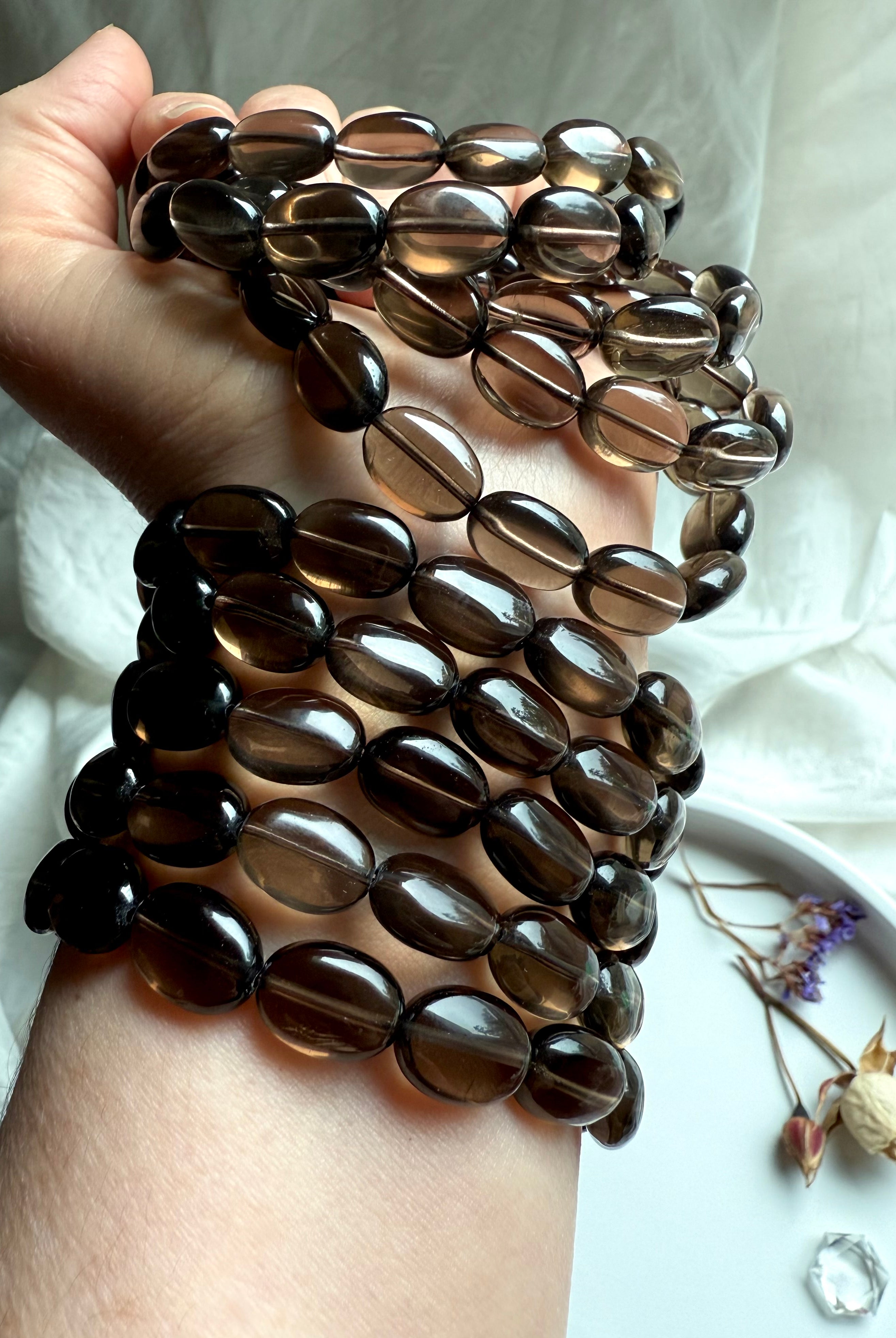 High-clarity Smoky Quartz crystal bracelet – polished flat oval beads for grounding, energy protection, and emotional balance