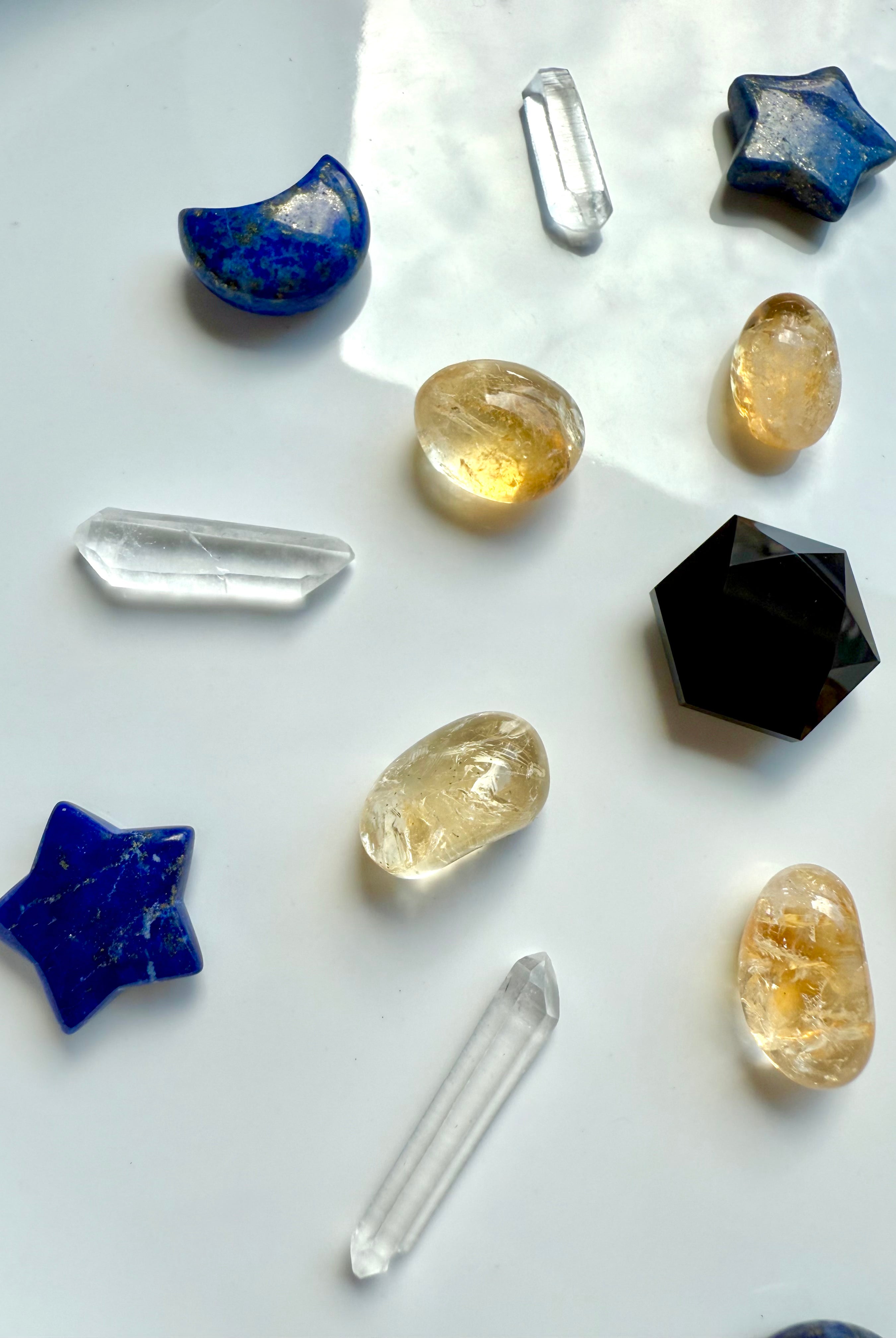 Deep blue Lapis Lazuli moons and stars – celestial carvings for altar or crystal grid