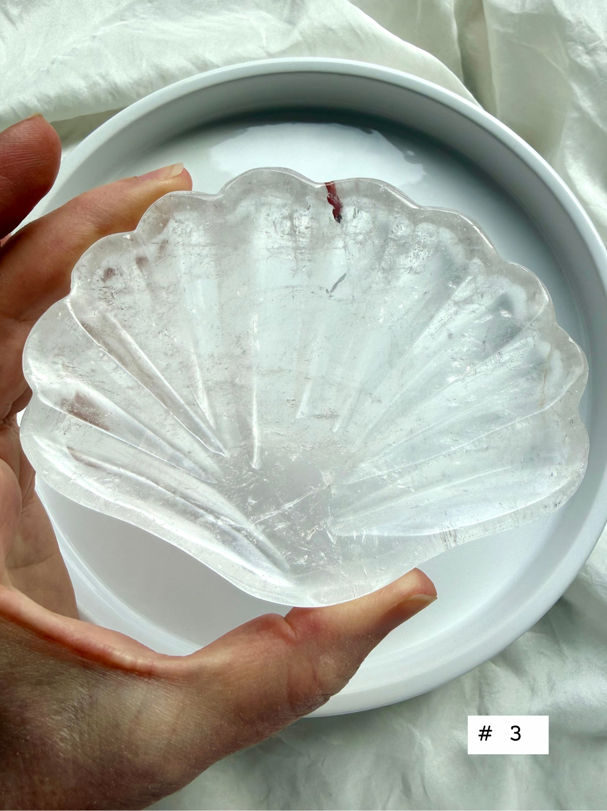 Clear Quartz shell bowl, individual piece #3, showing natural crystal patterns and polished scallop carving.