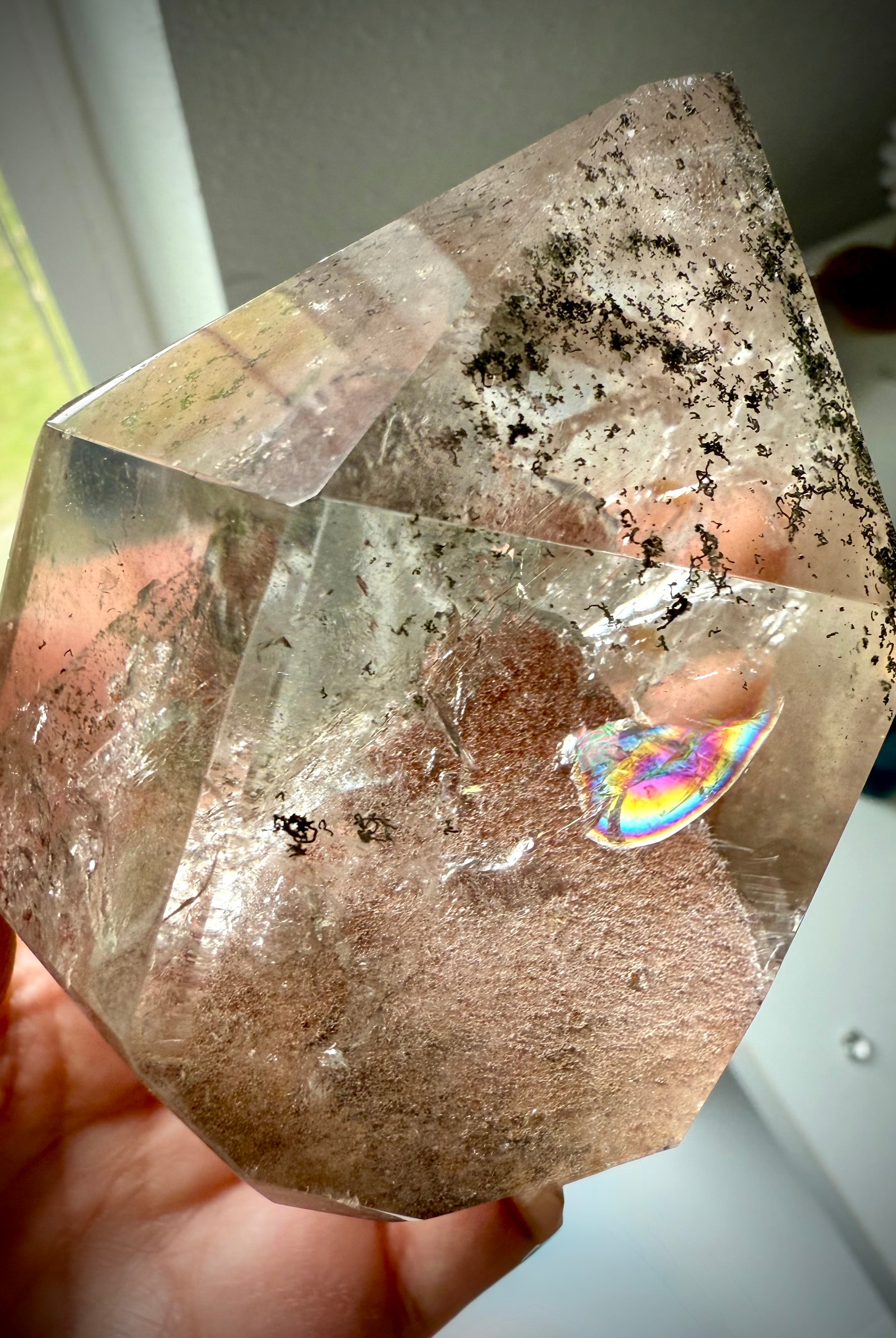 This Lodolite Garden Quartz Tower has a big reddish orange pyramid phantom, plus lots rainbows