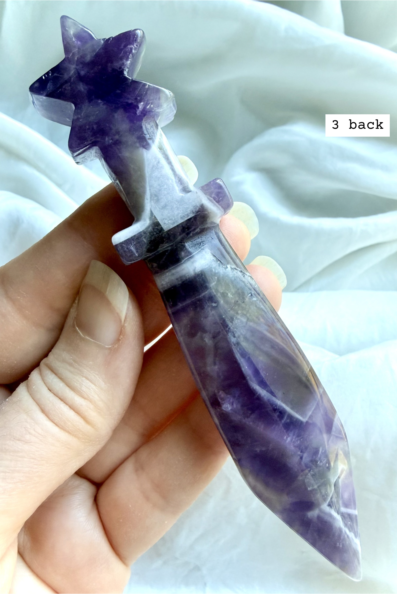 Back view of Dream Amethyst crystal athame with polished violet crystal patterning