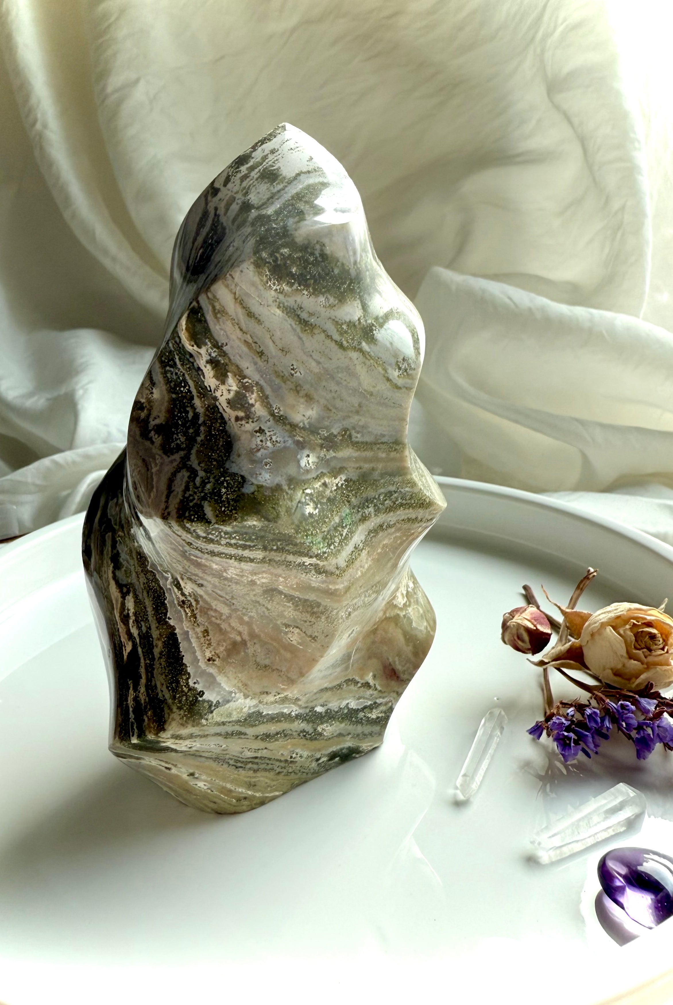 Standing Green Ocean Jasper flame with flowing moss-green bands and polished freeform curves, Earth-energy crystal for grounding and harmony.