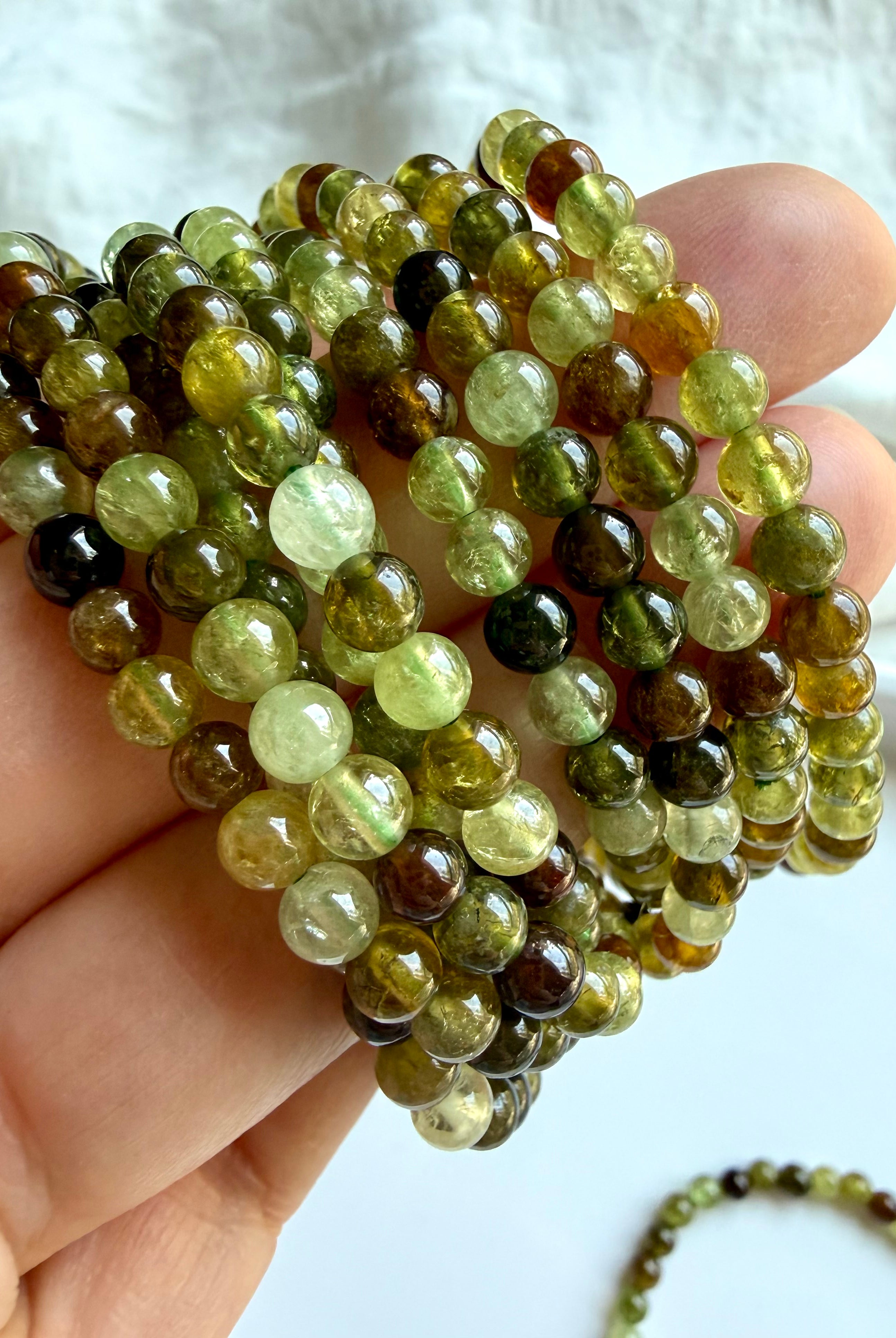 Tsavorite Garnet gemstone bracelets for abundance, vitality, confidence, and Heart Chakra healing
