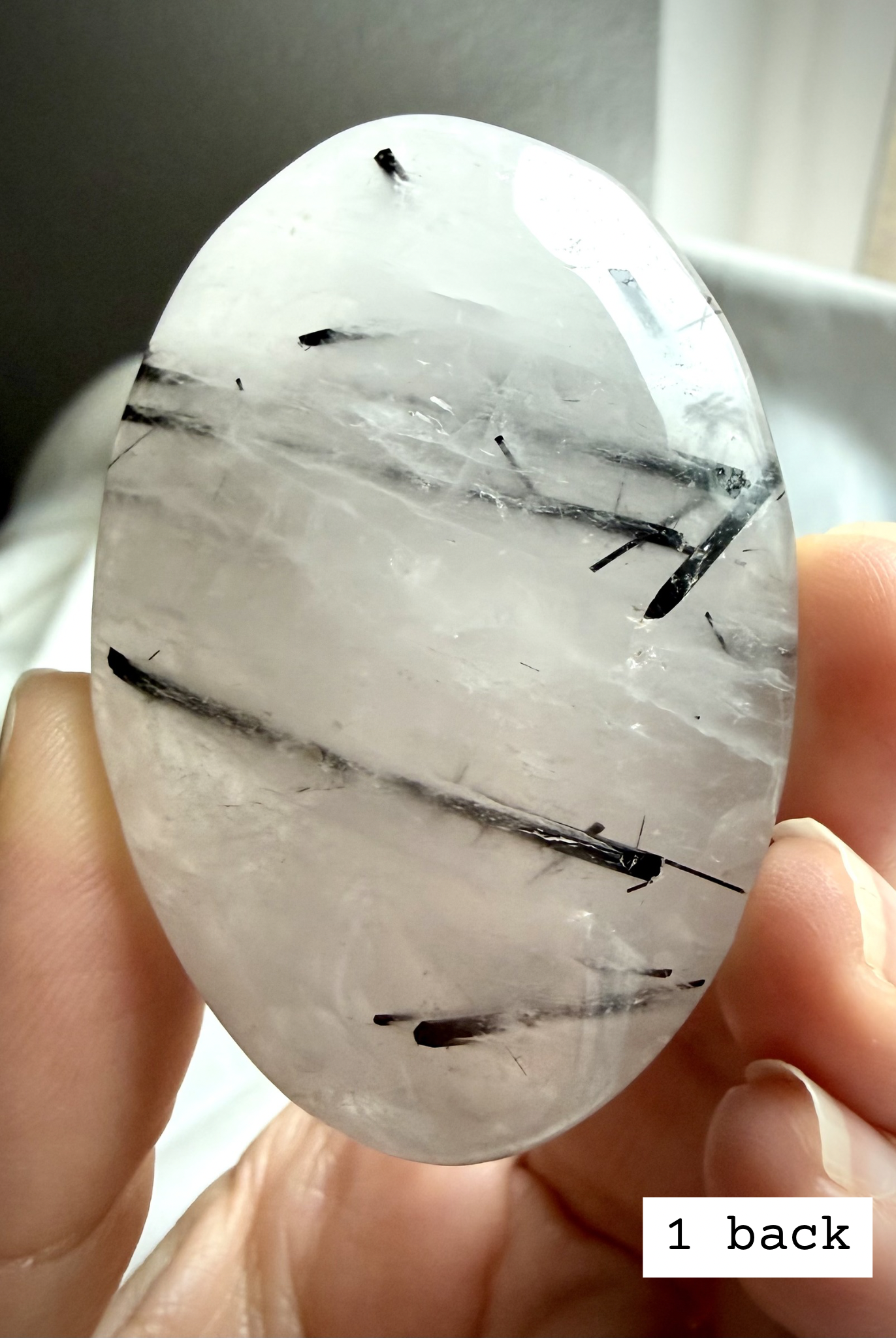 Black Tourmaline in Quartz palm stone 1 back view showing tourmaline inclusions in quartz