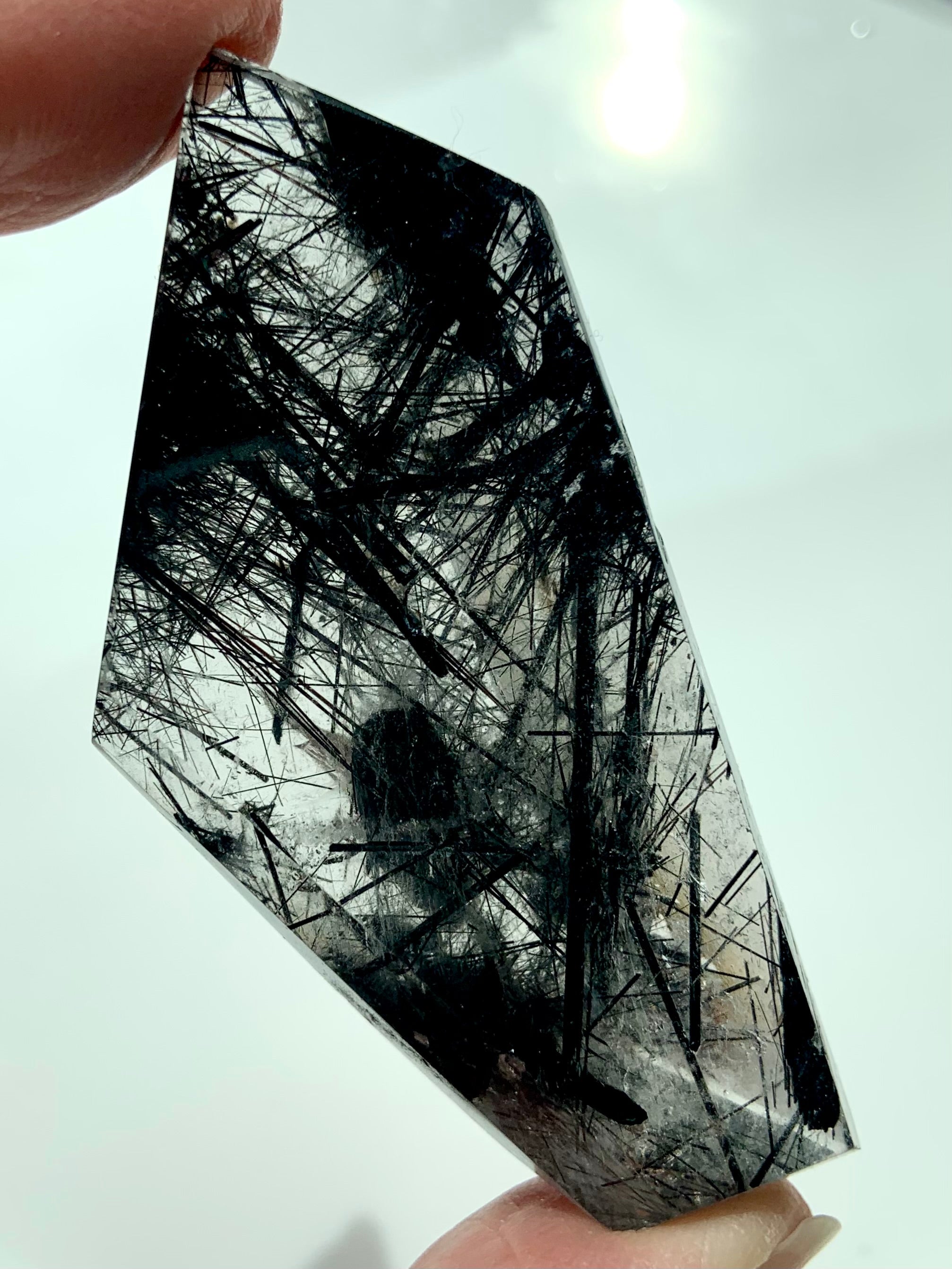 This high quality Black Tourmaline in Quartz polished Freeform Crystal Specimen would make a wonderful gift for any crystal collector.
