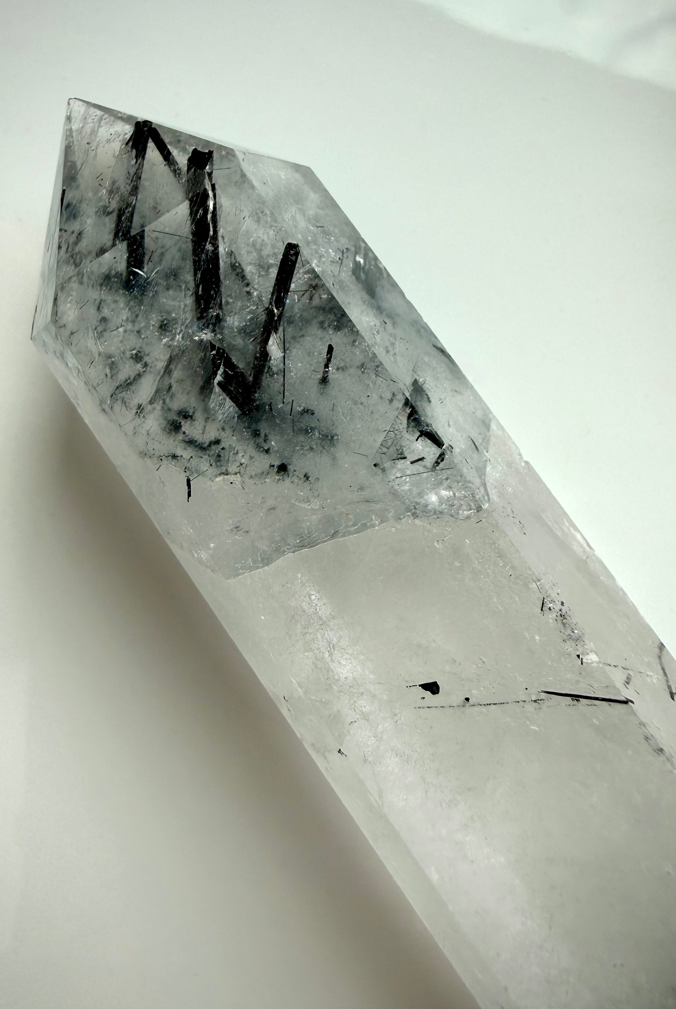 tourmalinated quartz DT crystal with black tourmaline needles and polished facets