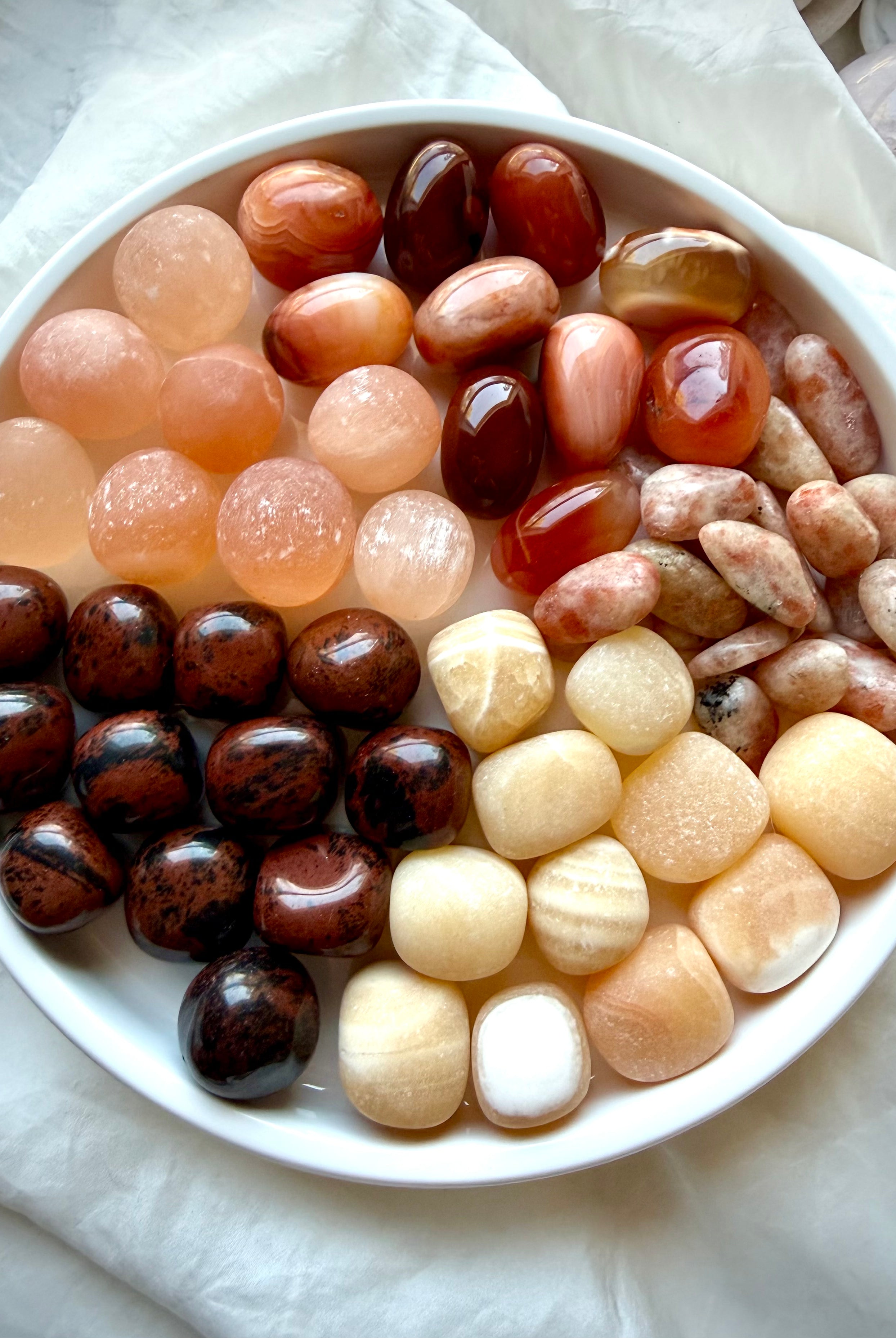 Orange Calcite, Carnelian, Peach Selenite, Mahogany Obsidian, and Sunstone crystal set for Sacral Chakra healing