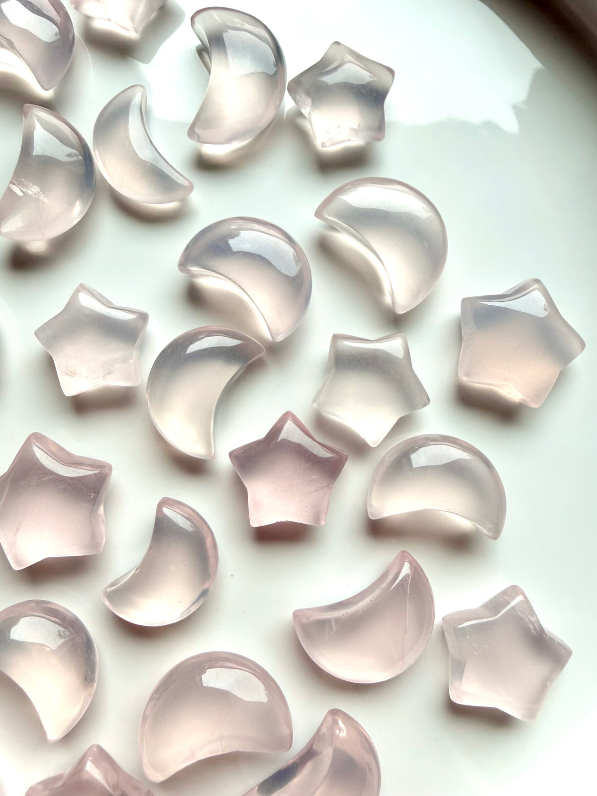 Rose Quartz mini moons and stars with soft pink translucence and natural variations in shape and clarity