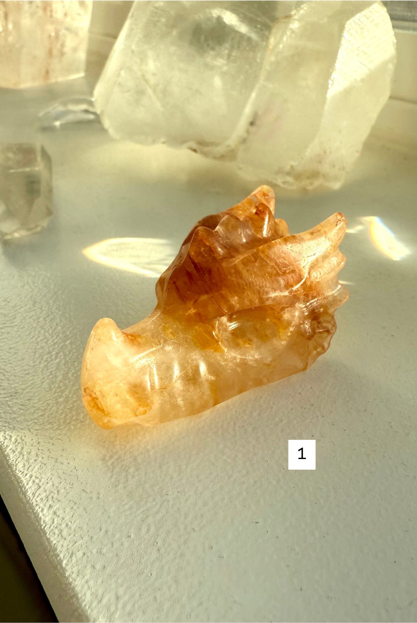 Polished Golden Healer Quartz dragon head carving in golden tones with natural veining — crystal totem for chakra alignment and meditation.