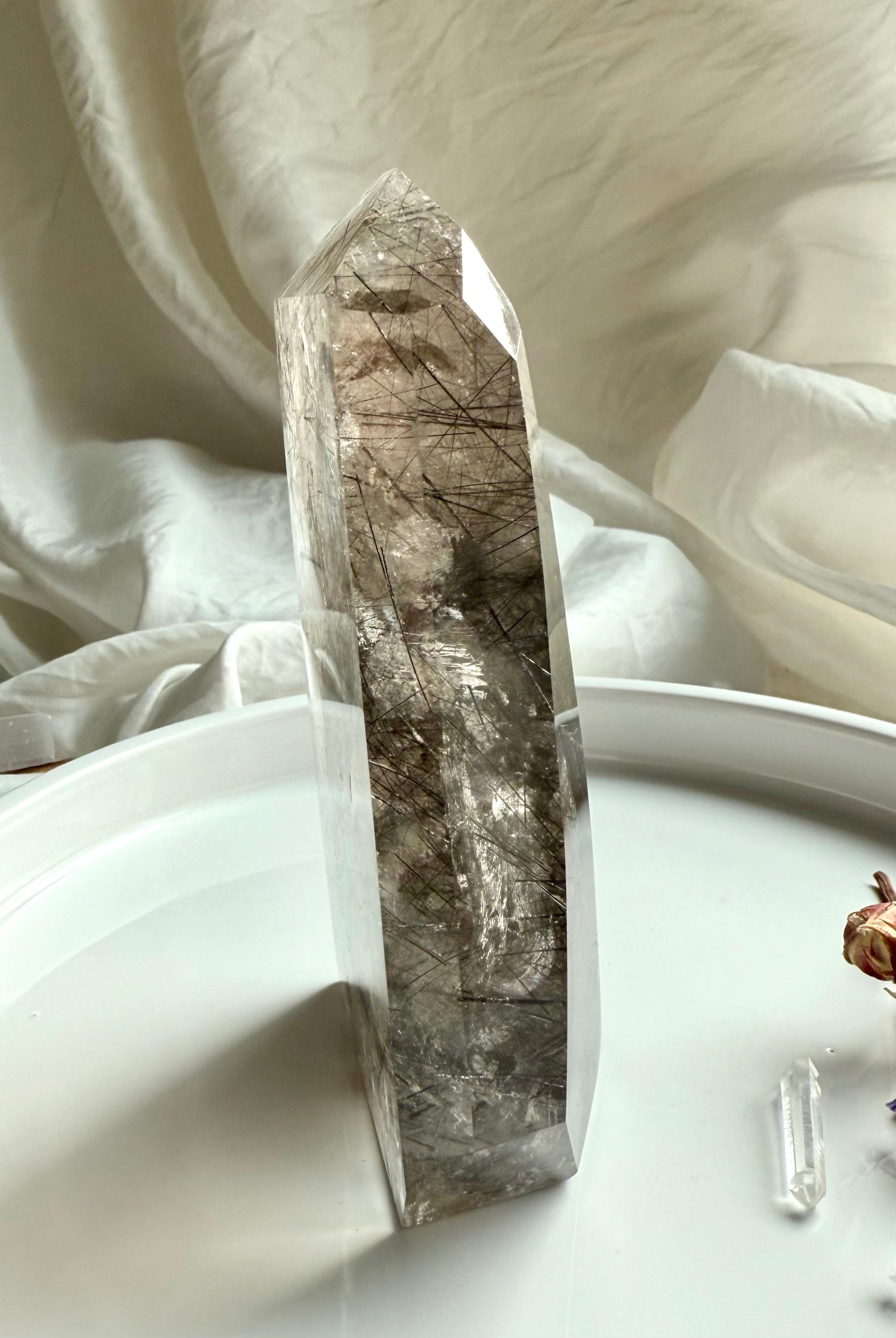 Side view of faceted Tourmalinated Quartz freeform tower showing depth and crystal clarity