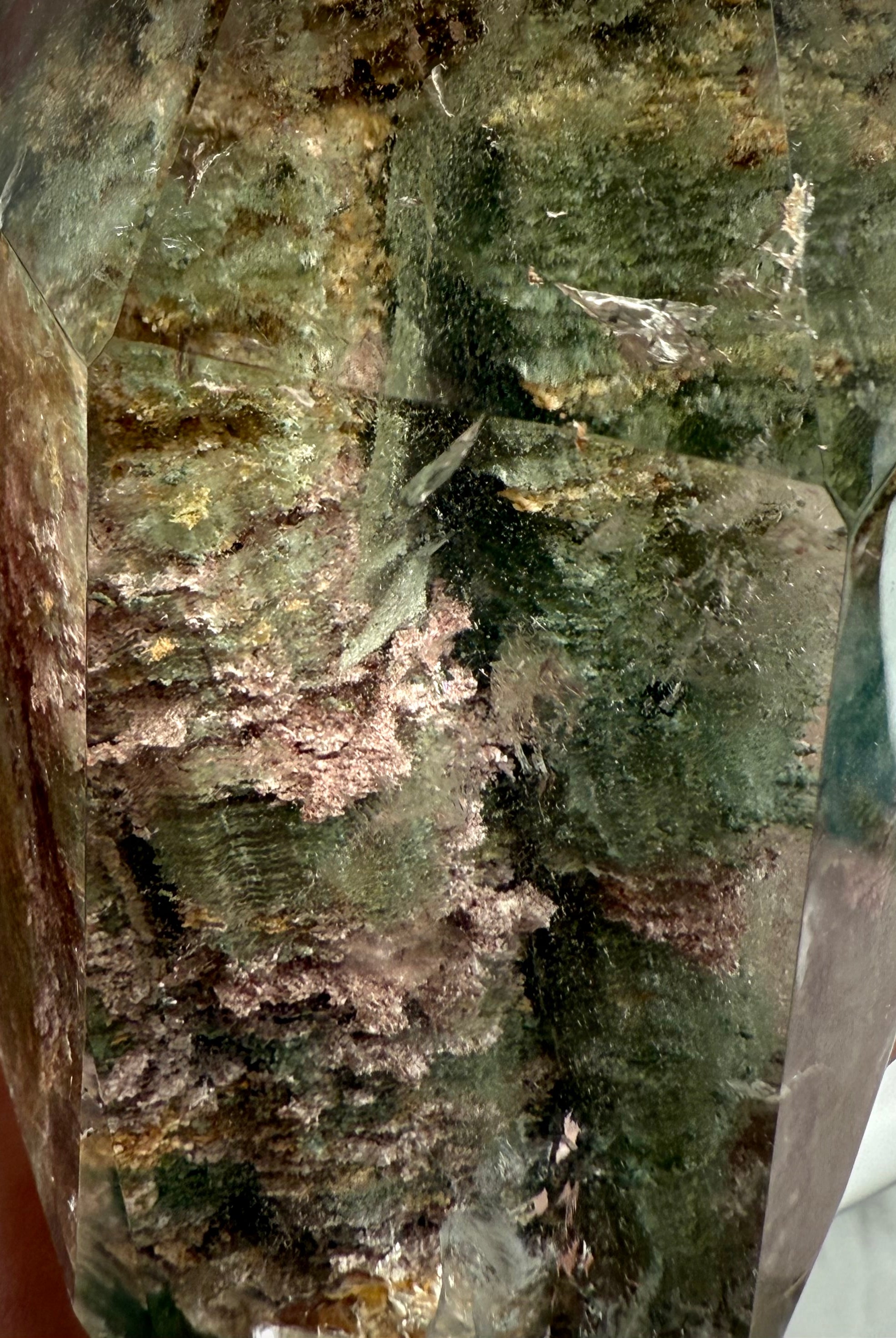 Close up of Thousand Layer Garden Quartz phantom crystal revealing intricate layered mineral formations