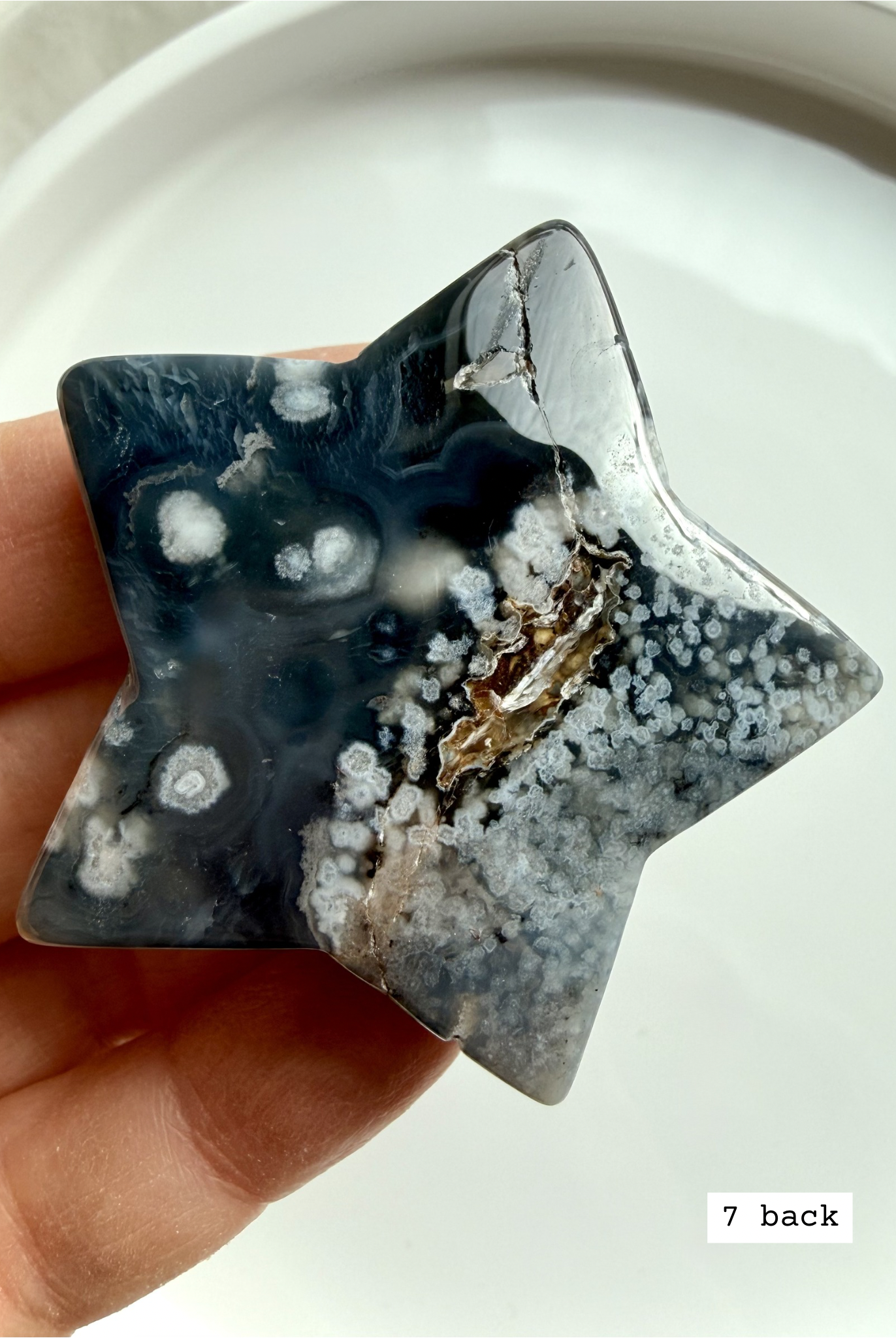 black flower agate star carving #7 back showing organic mineral inclusions and smooth polish