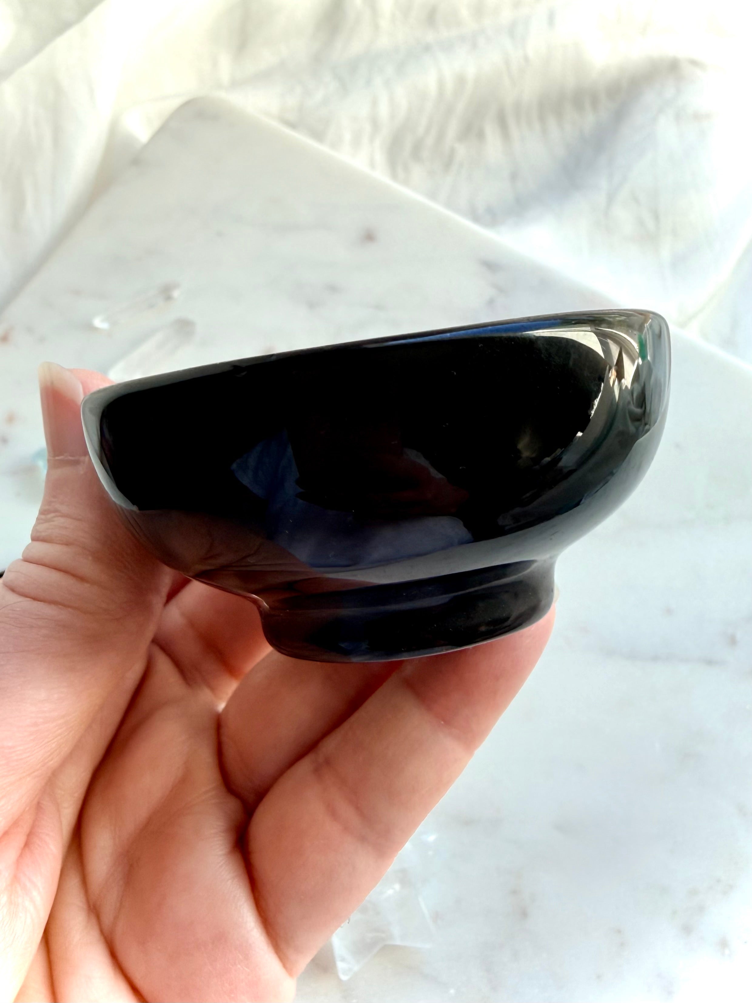Side view of Black Obsidian crystal bowl for jewelry organization and altar decor