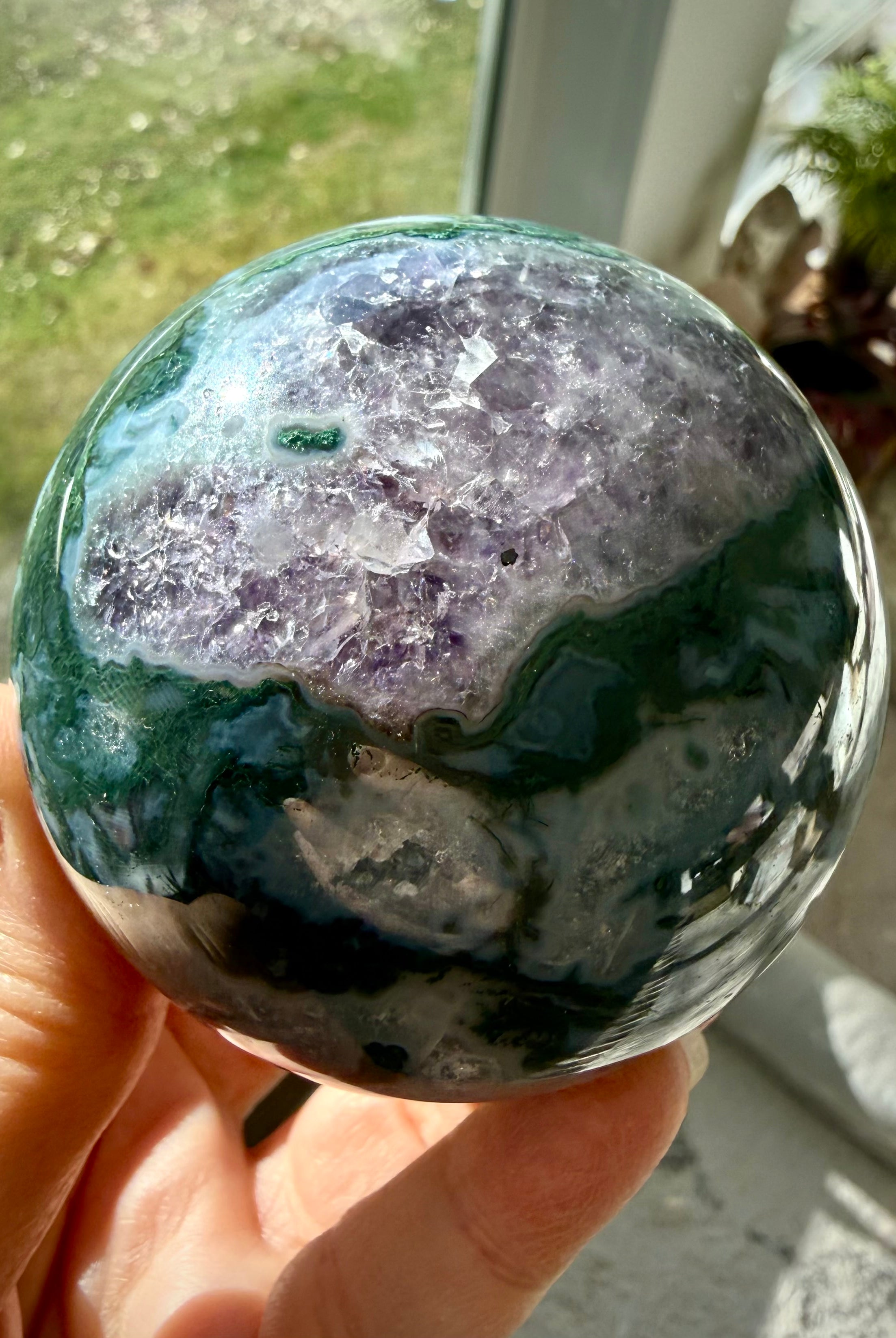 Moss Agate sphere with Amethyst druzy crystal pockets and natural green, purple, and white patterns