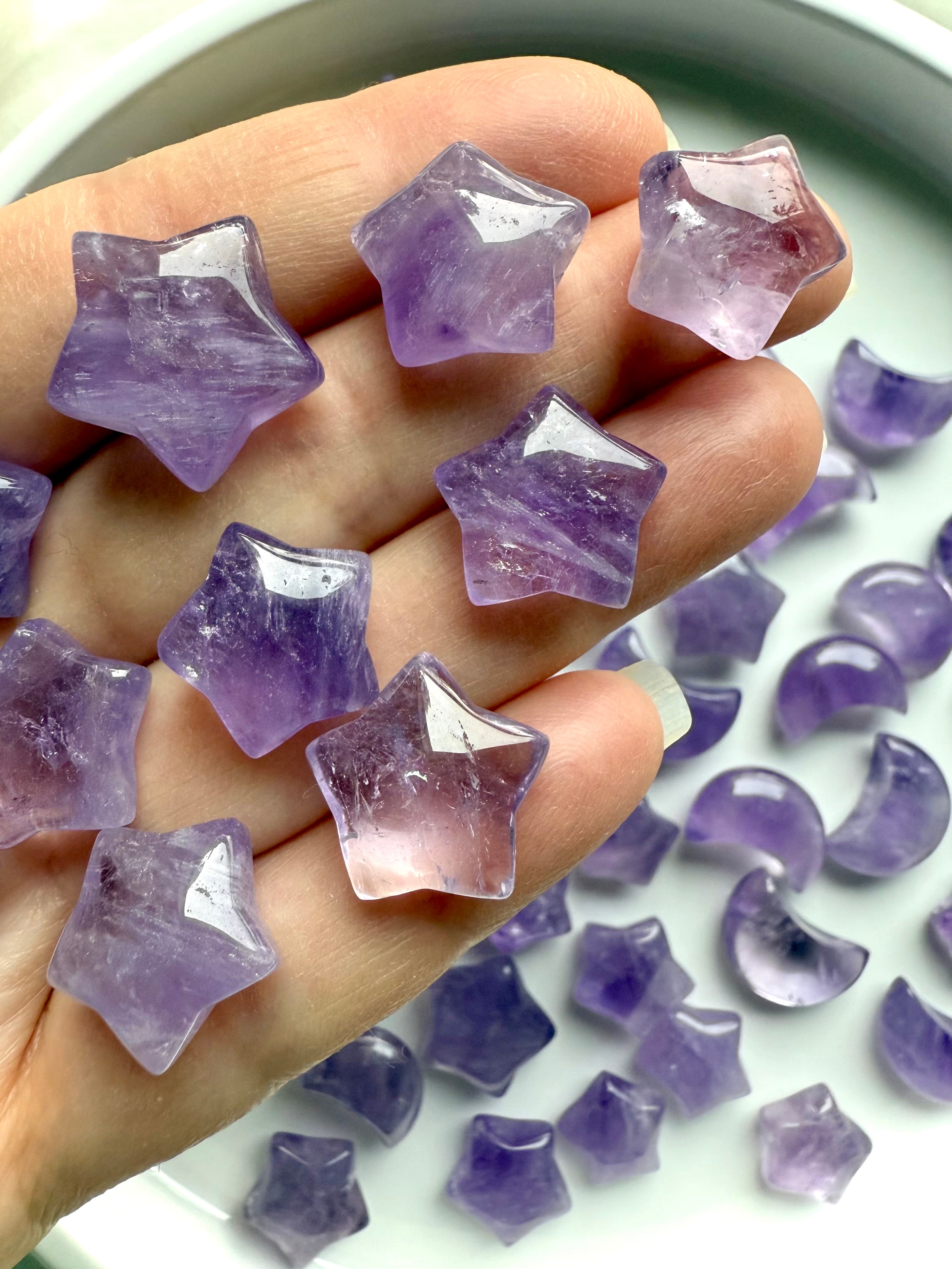 Mini Amethyst star crystals held in hand, calming Third Eye and Crown Chakra stones for peace and clarity
