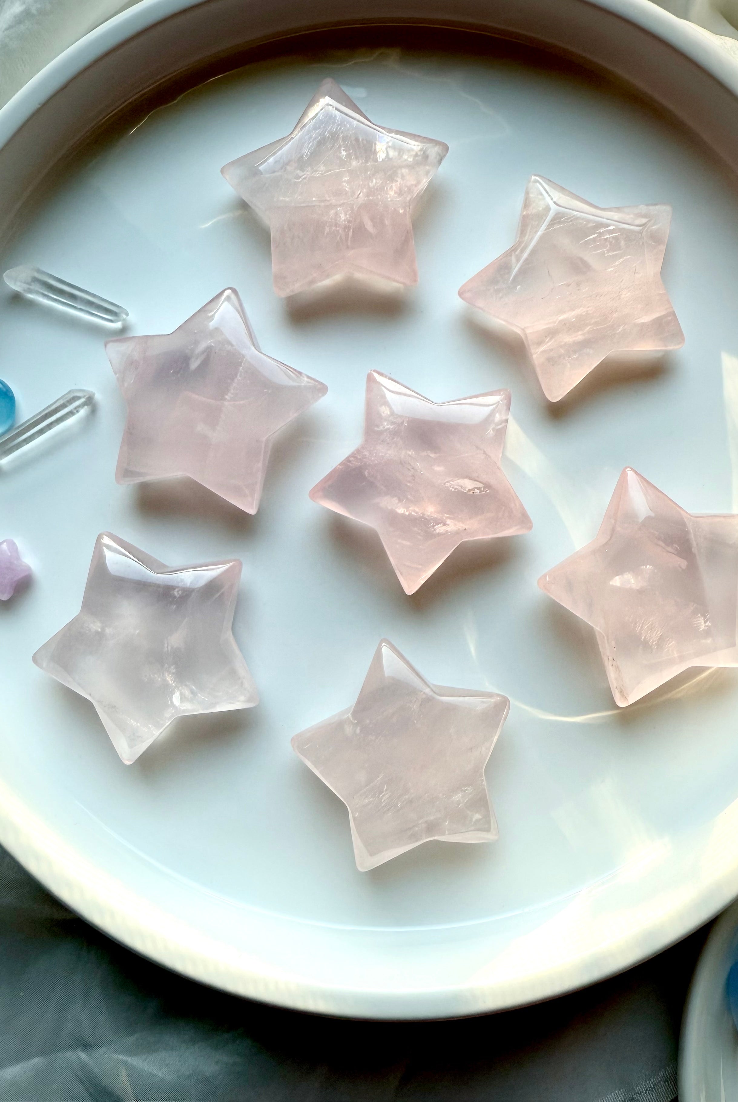 Large Mozambique Rose Quartz Stars — pink crystal star carvings 1.85–2.05 inches each, polished for Heart Chakra healing and energy work.