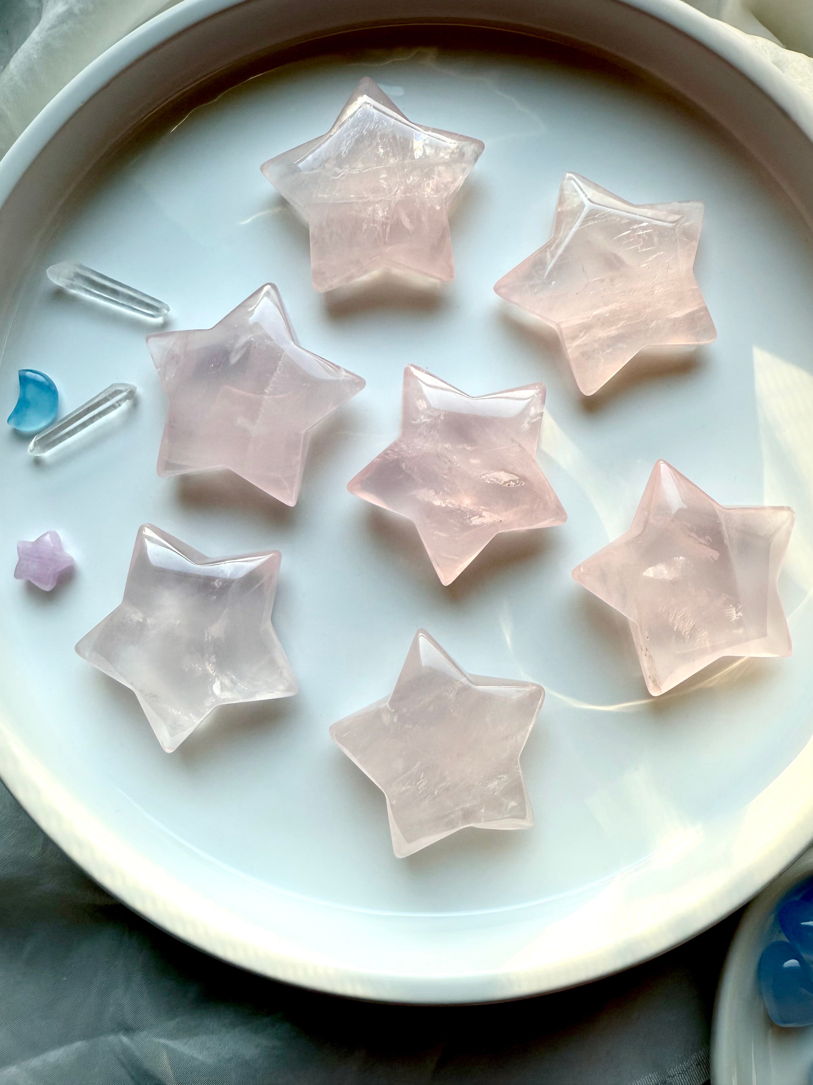 Large Mozambique Rose Quartz Stars — pink crystal star carvings 1.85–2.05 inches each, polished for Heart Chakra healing and energy work.