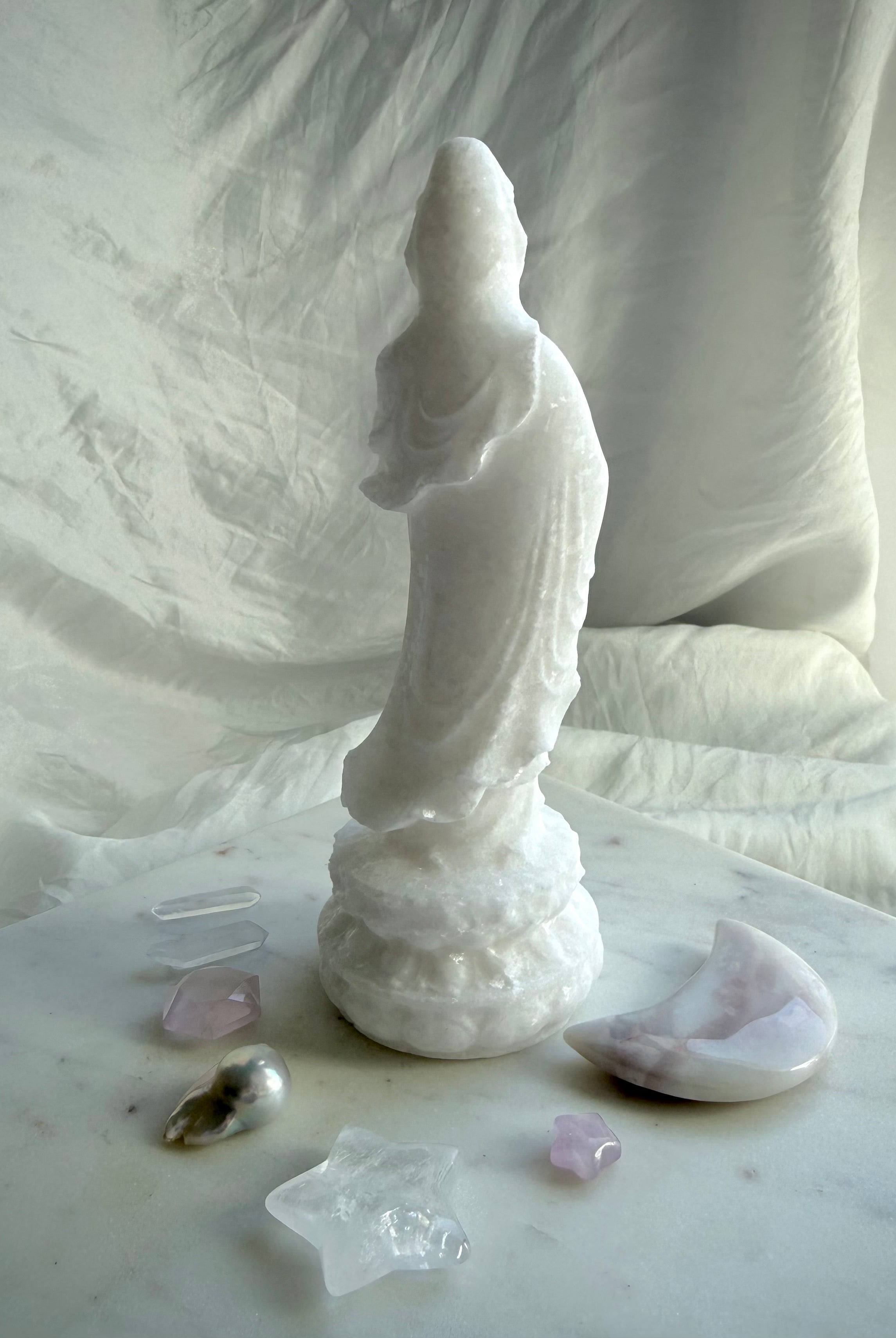 Back view of White Jade Standing Goddess carving highlighting flowing robes and craftsmanship