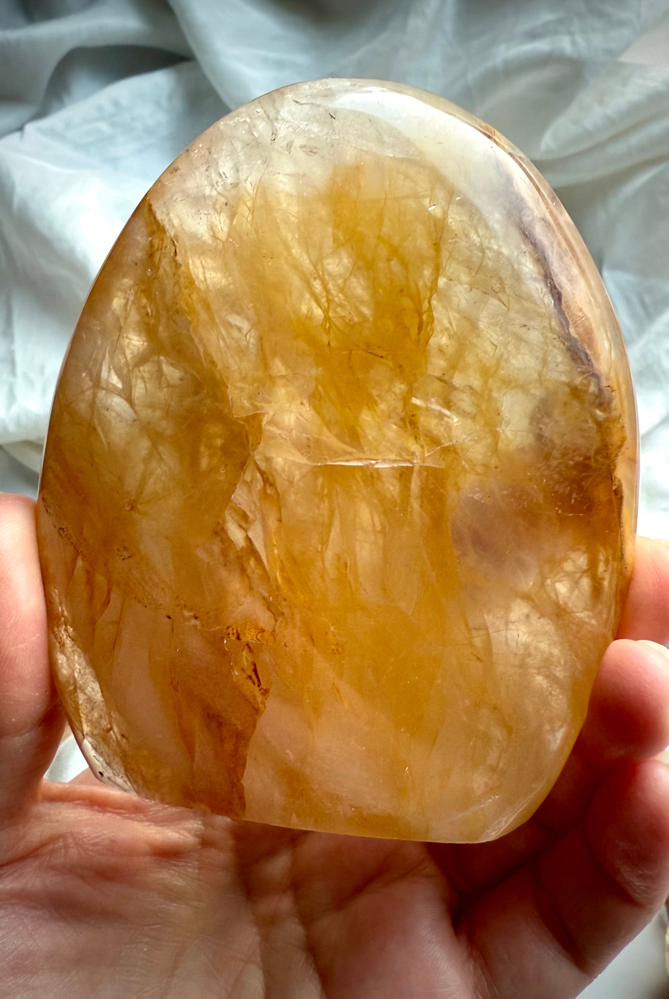 Luminous Golden Healer Quartz freeform with warm golden translucence and polished display shape
