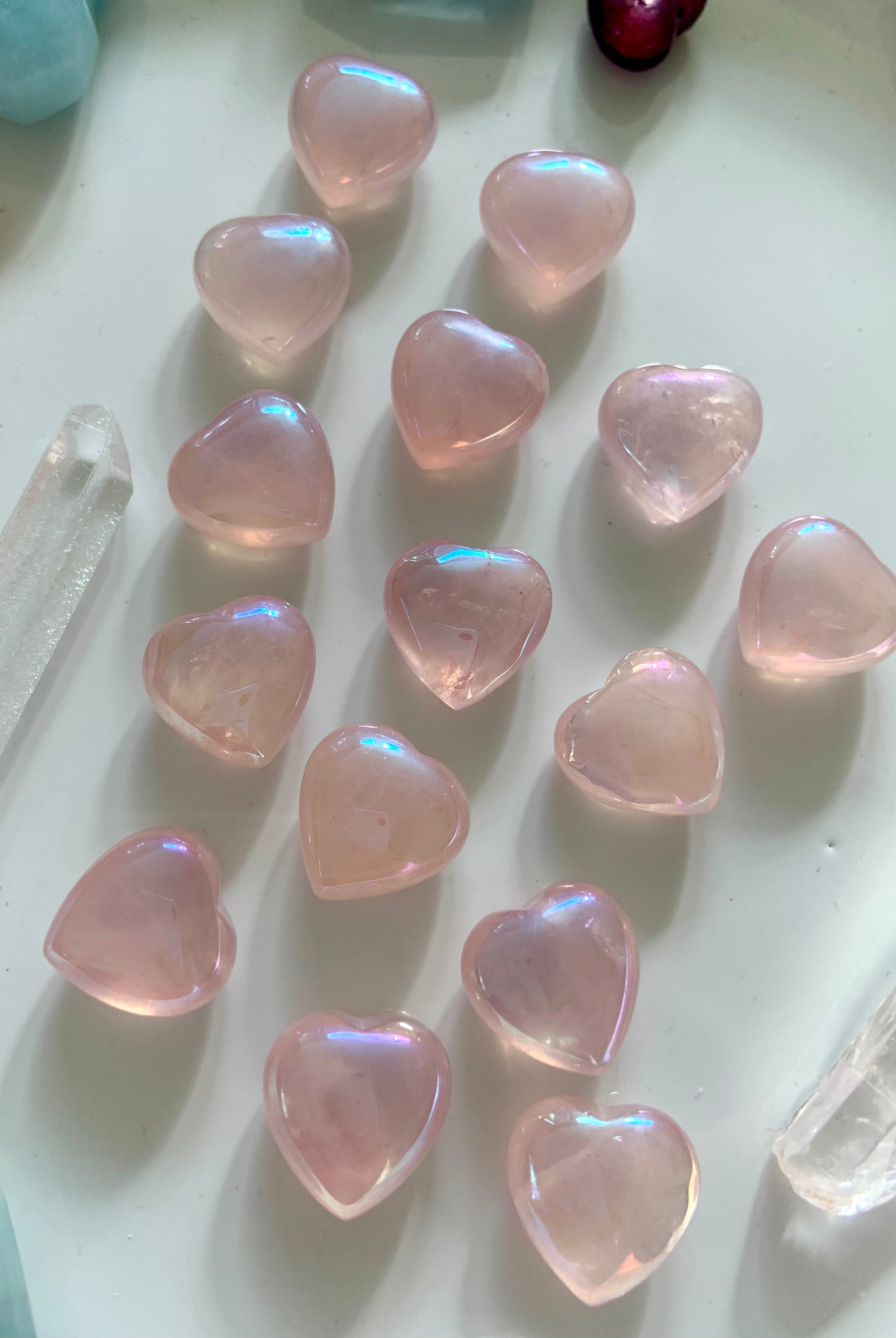 Alternate flatlay view of mini aura rose quartz hearts with glowing crystal accents — high-vibe pink stones for love, harmony & sacred rituals