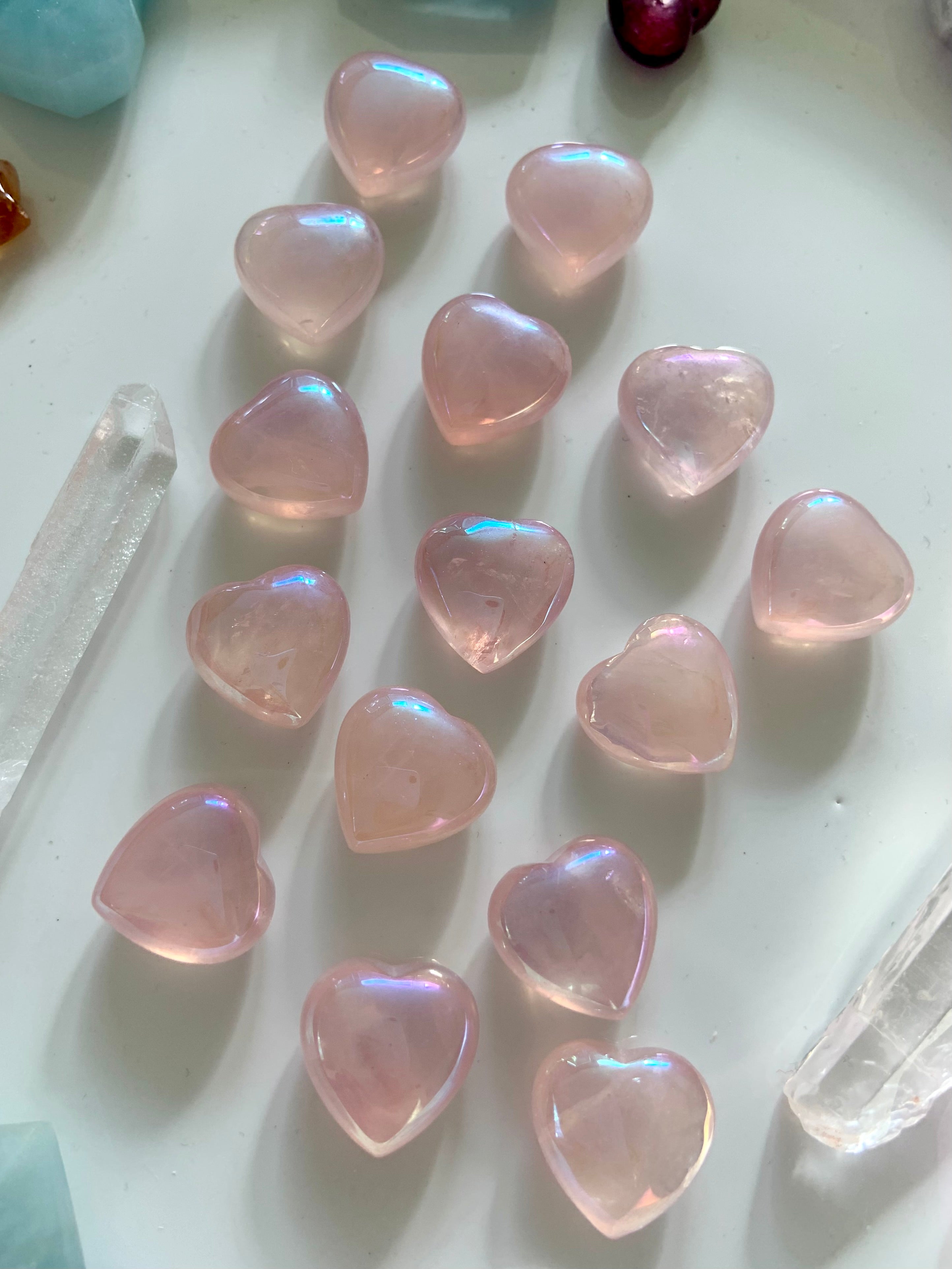 Alternate flatlay view of mini aura rose quartz hearts with glowing crystal accents — high-vibe pink stones for love, harmony & sacred rituals