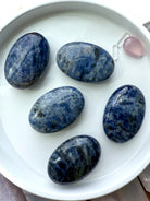 An assortment of high quality blue Sodalite Palmstones for Throat Chakra clearing and activation