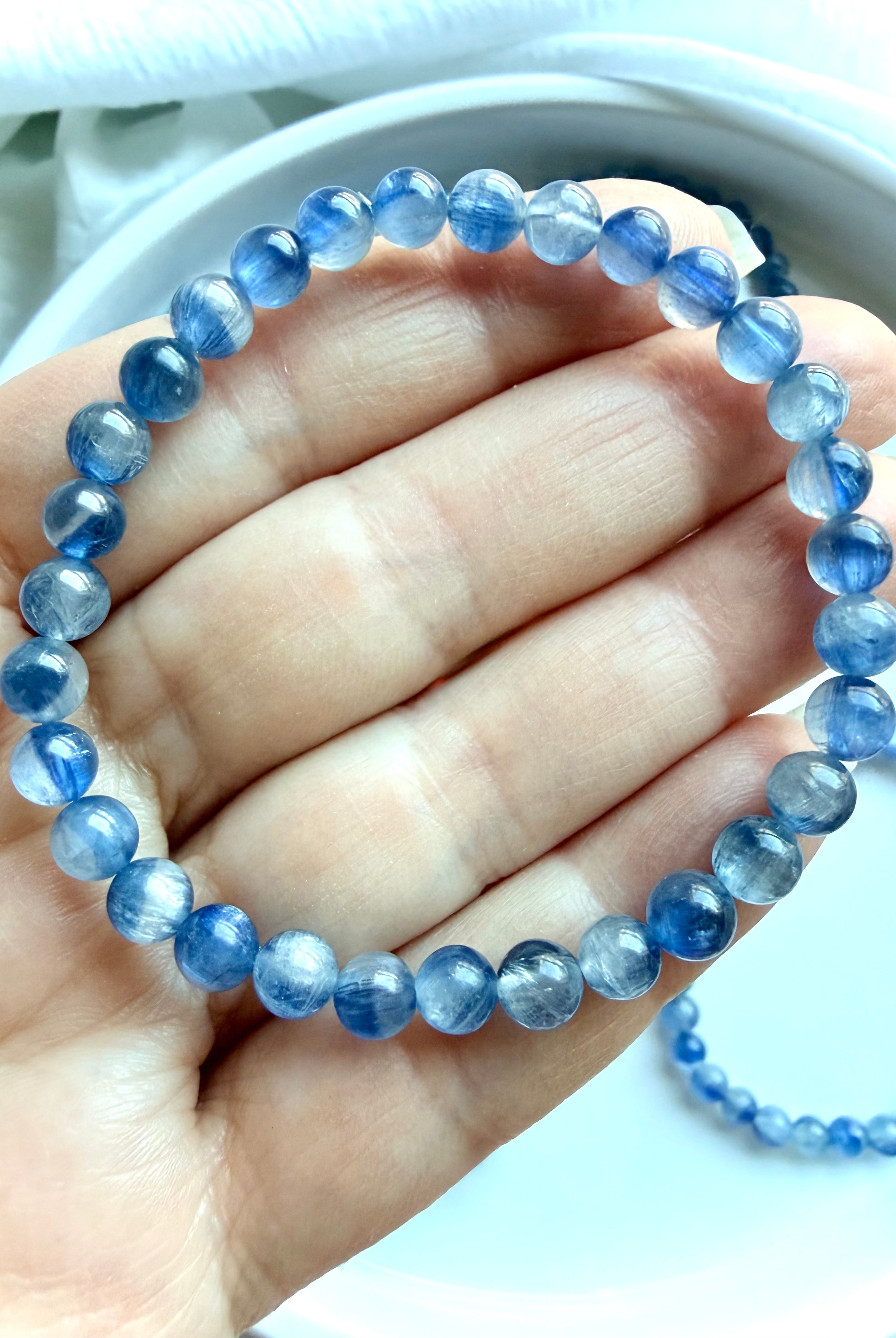 Blue Kyanite crystal bracelet showcasing luminous natural gemstones with layered blue color variation