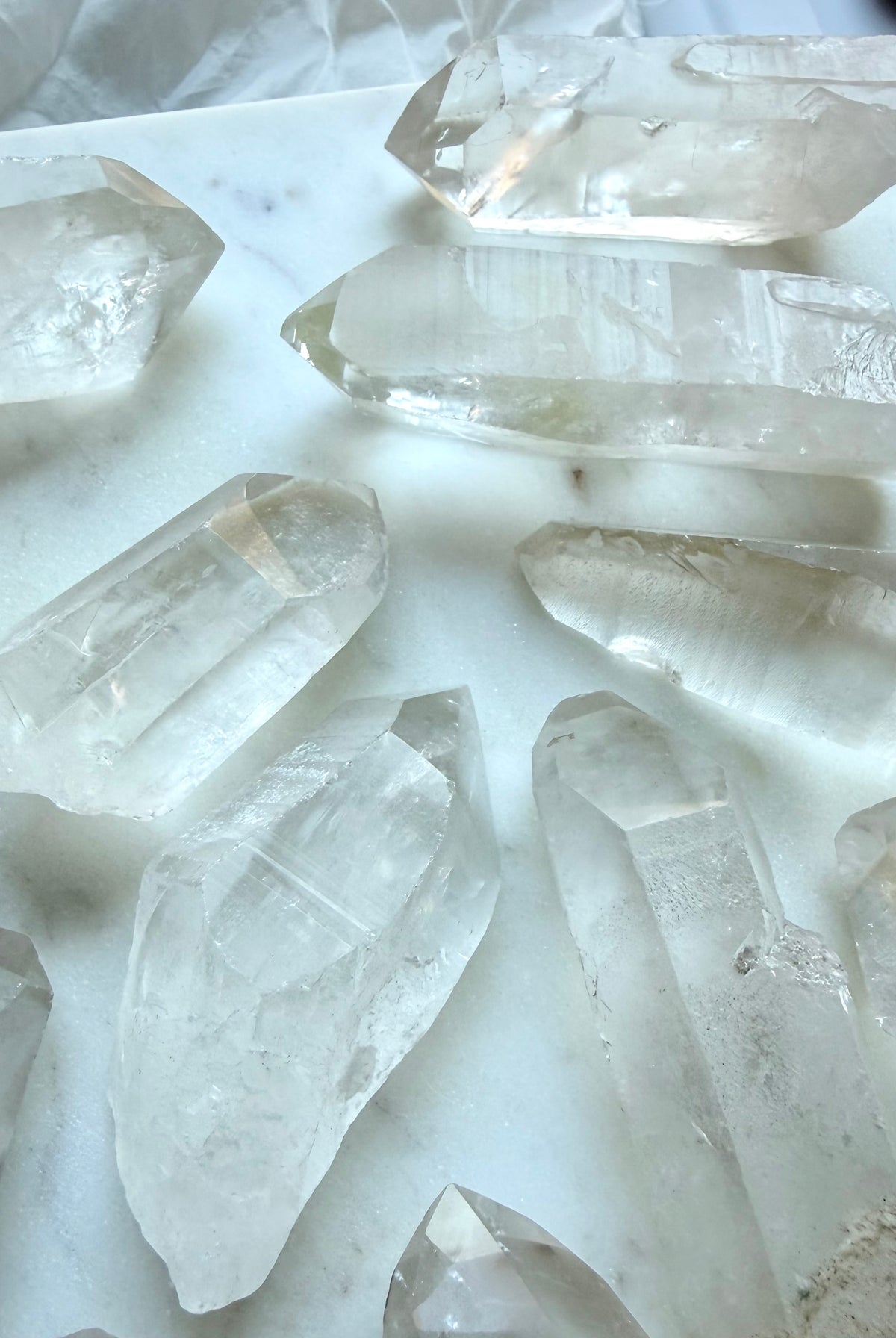 Lemurian Quartz showing textured horizontal ladder lines and natural growth striations across the crystal surface