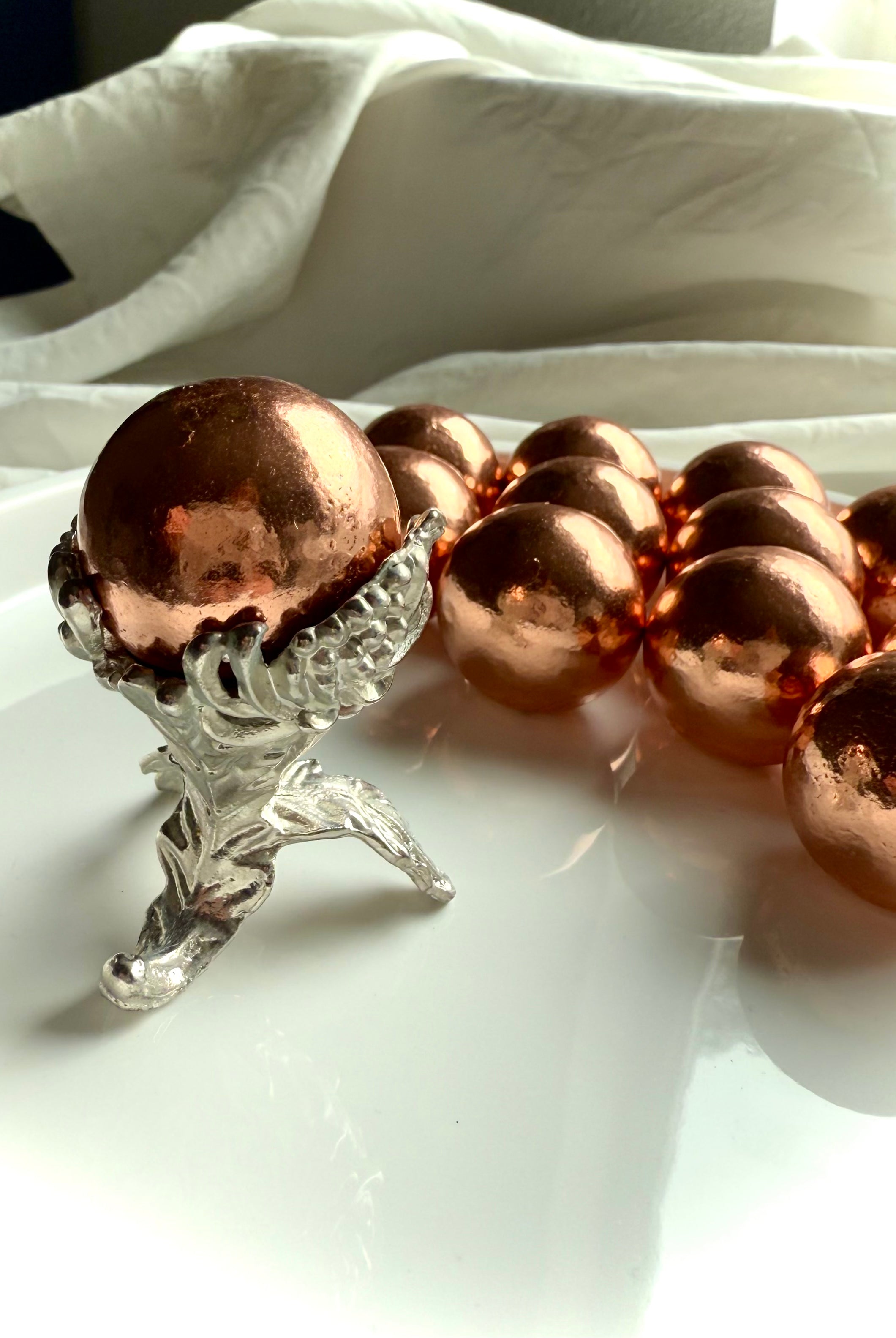 Botanical Metal Stand shown with the Michigan copper sphere option available in the dropdown menu
