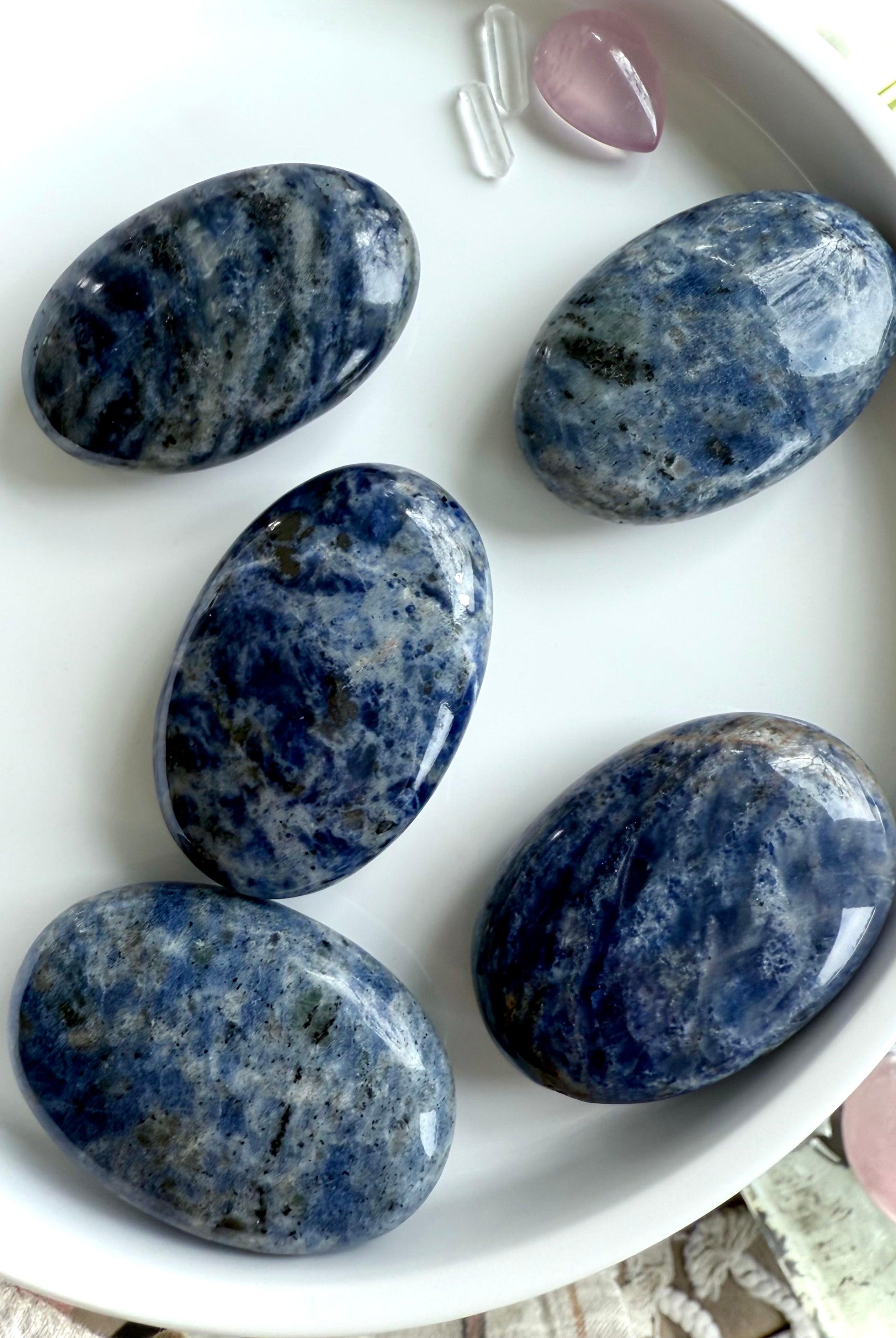 Naturally blue Sodalite Palm Stones open + activate the Throat Chakra for clear communication
