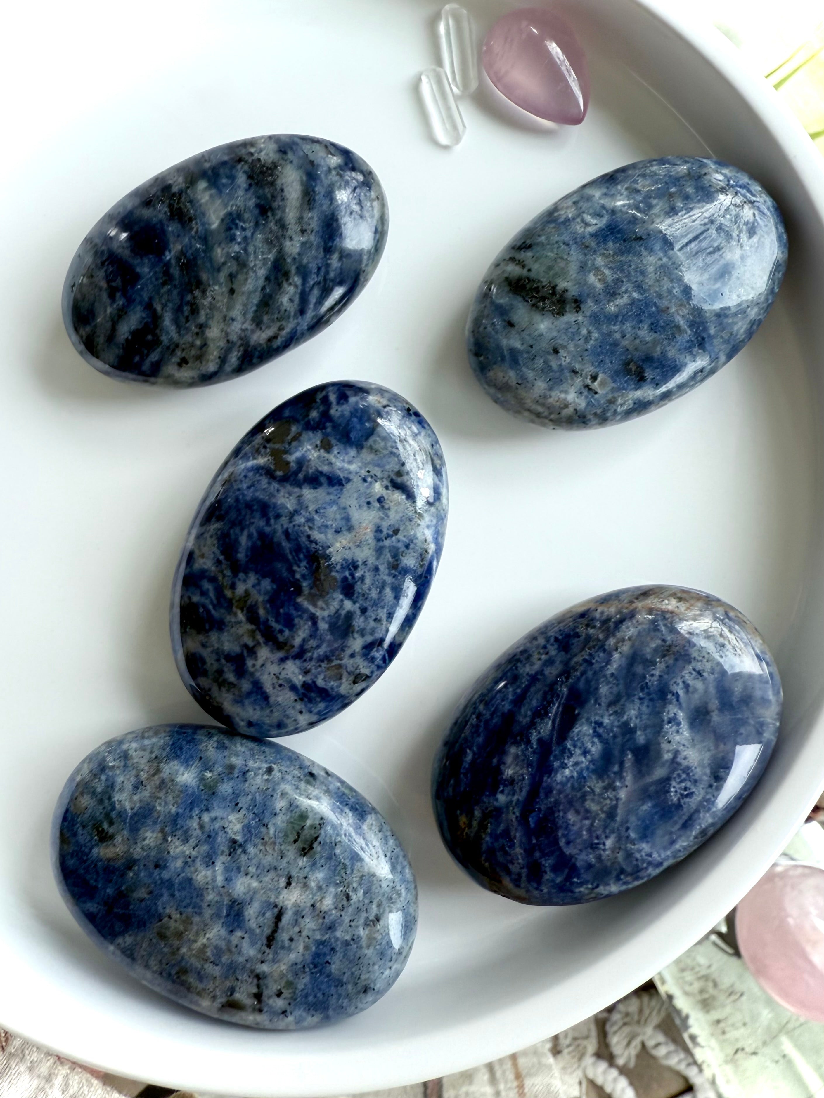 Naturally blue Sodalite Palm Stones open + activate the Throat Chakra for clear communication