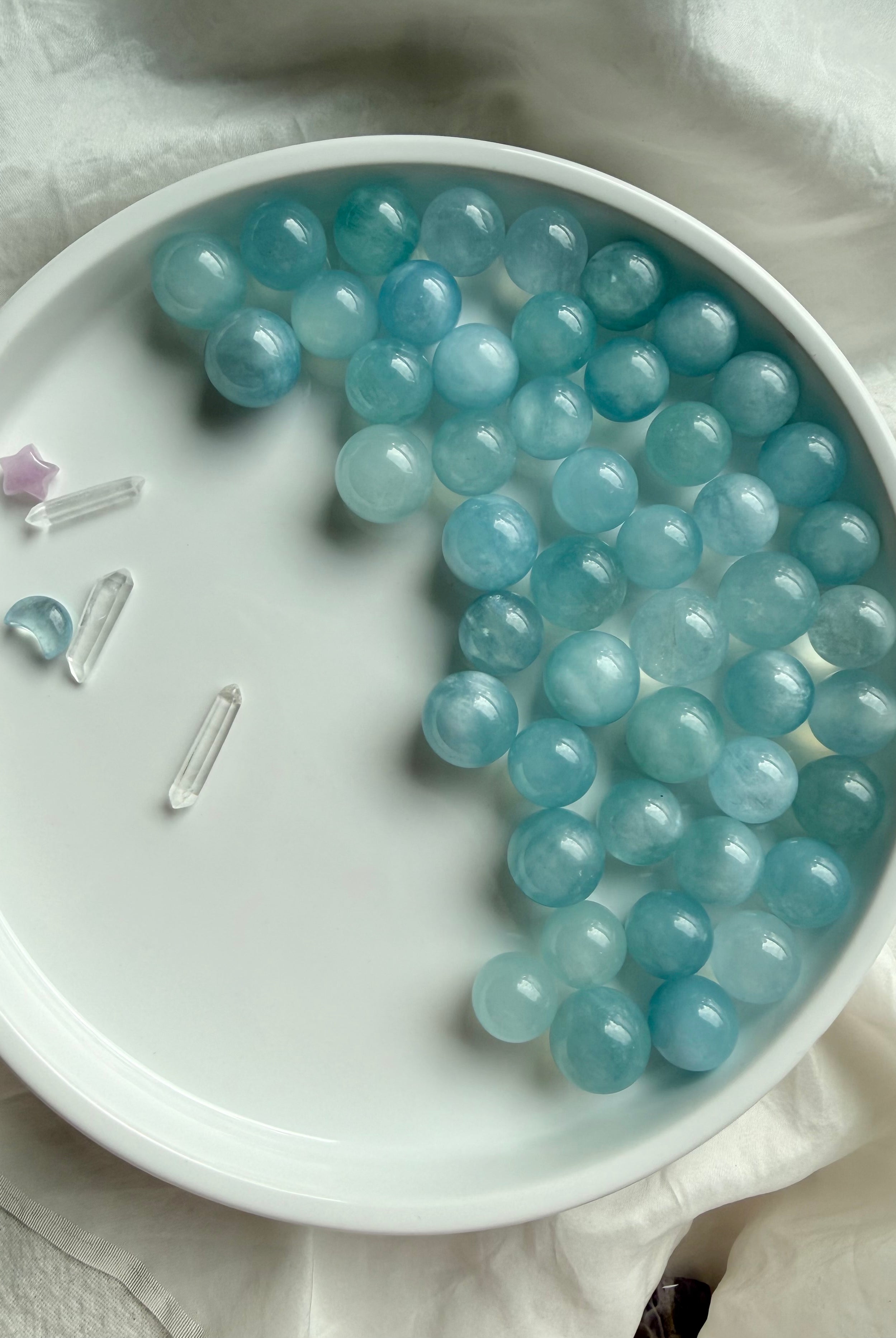 Blue Aquamarine mini spheres with clear quartz points – soothing March birthstone crystal display