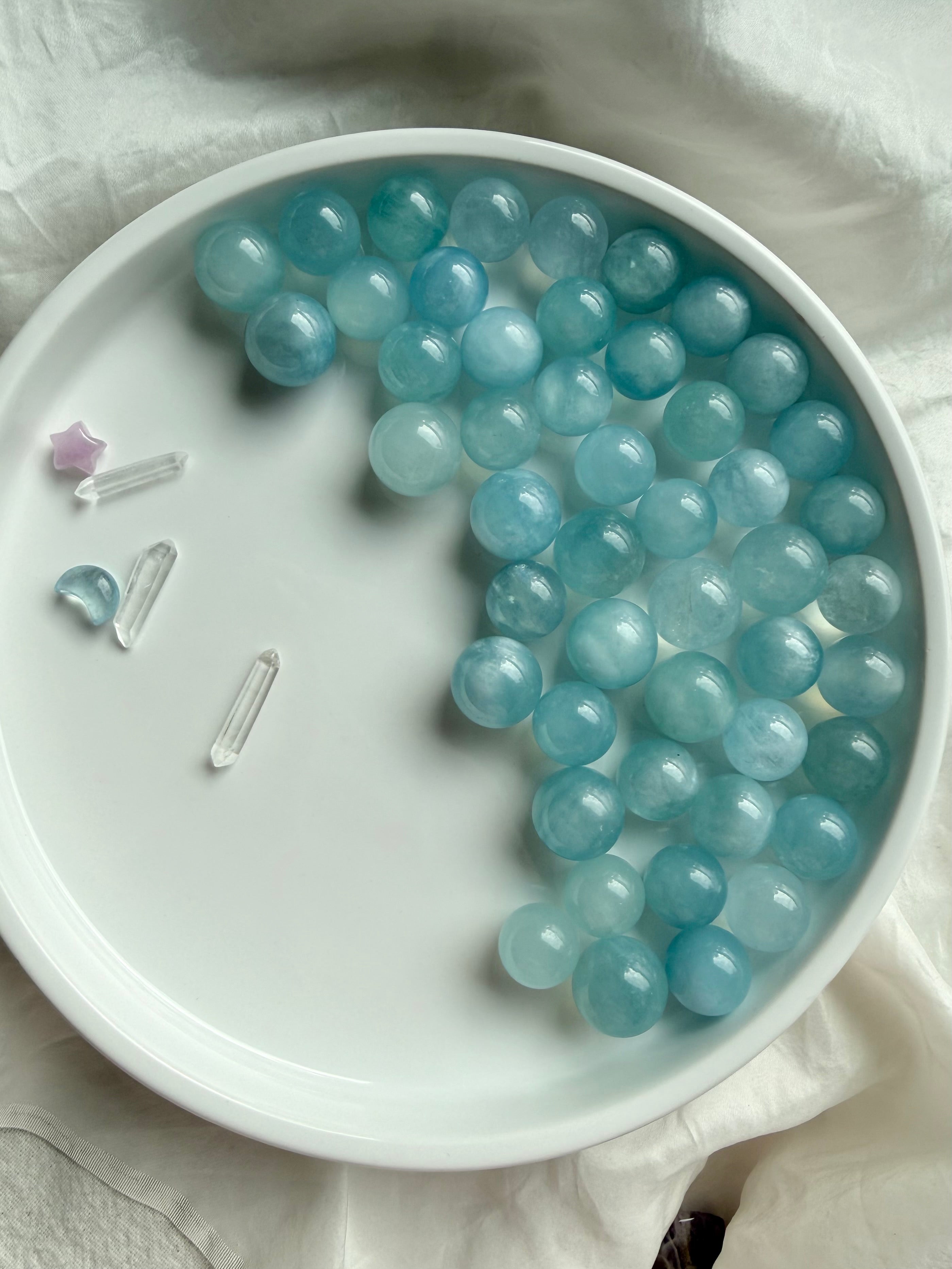 Blue Aquamarine mini spheres with clear quartz points – soothing March birthstone crystal display