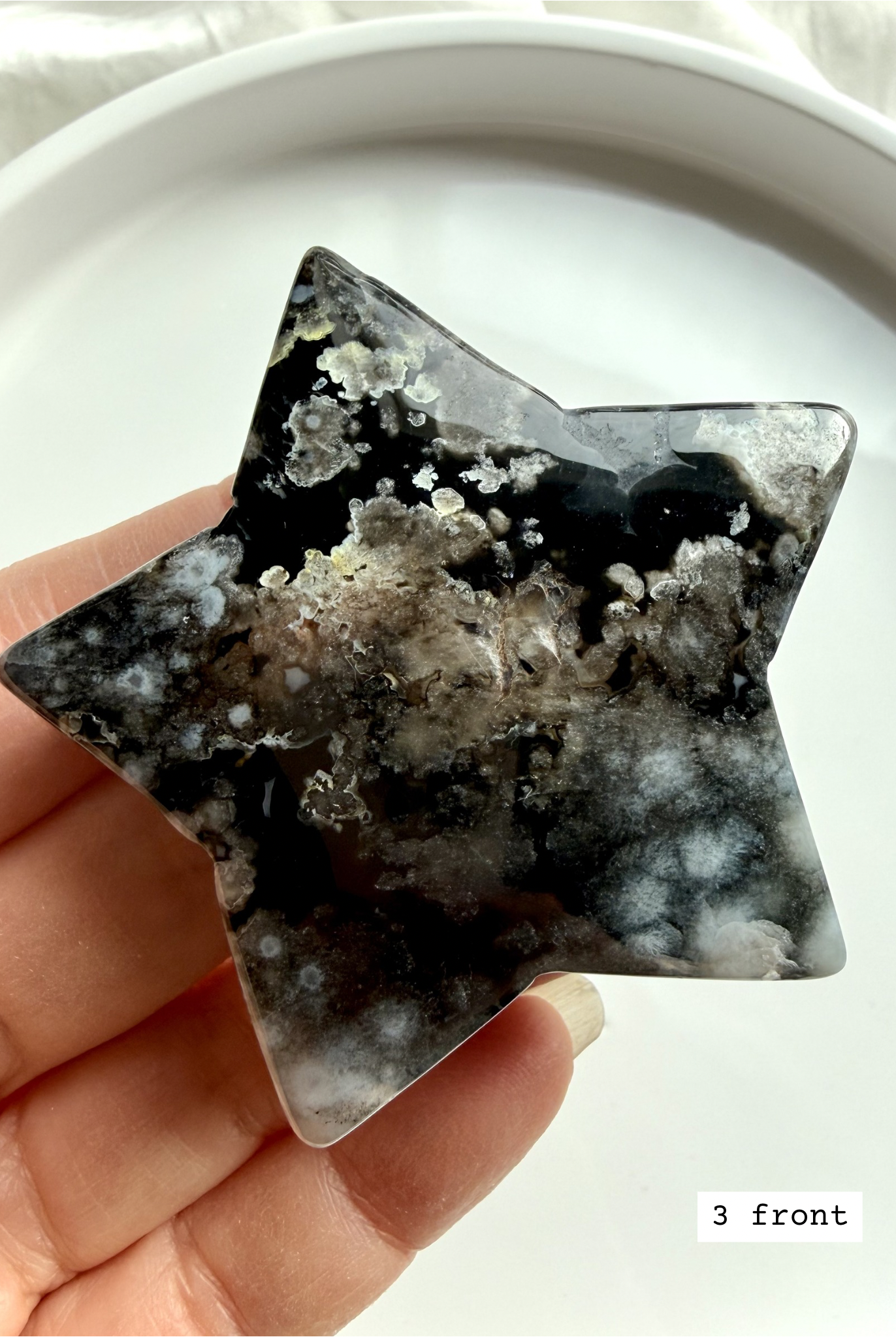 black flower agate star carving #3 front showing high contrast floral formations and druzy details
