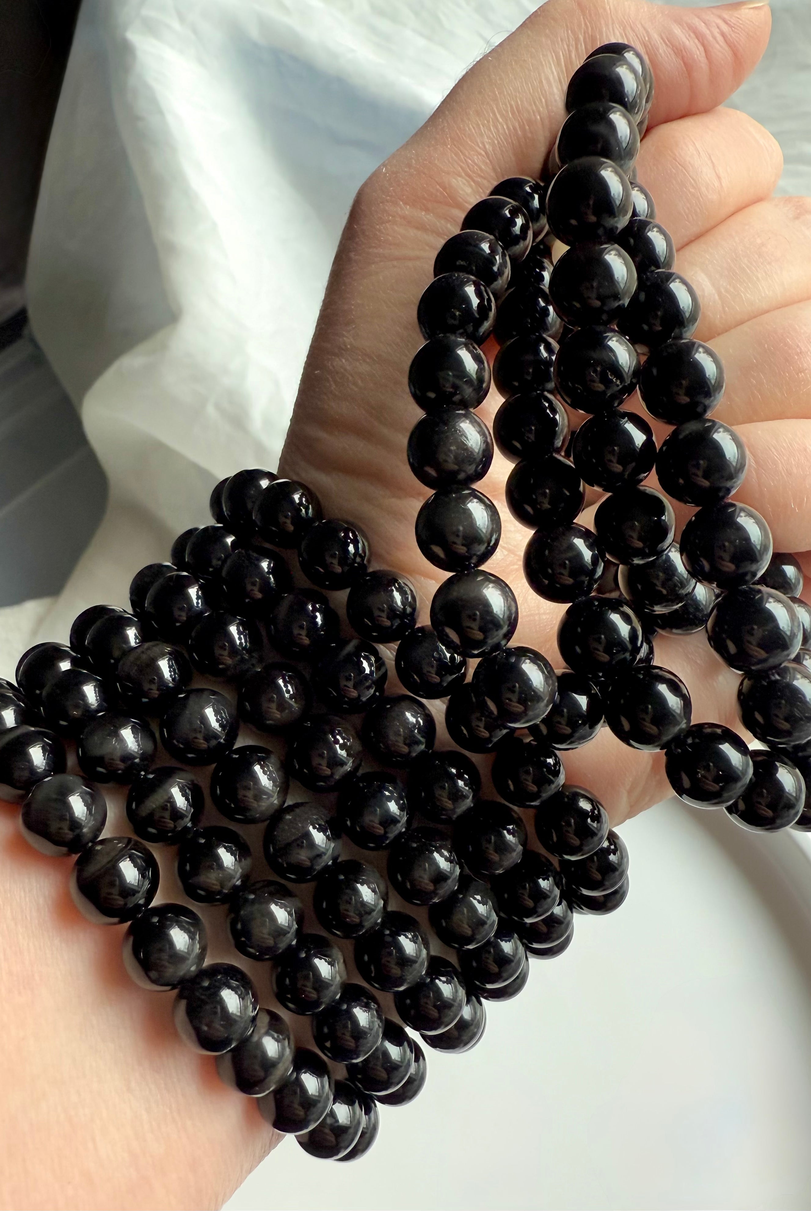 Wear your natural Black Tigers Eye Bracelet to ground your Root Chakra + offer energetic protection
