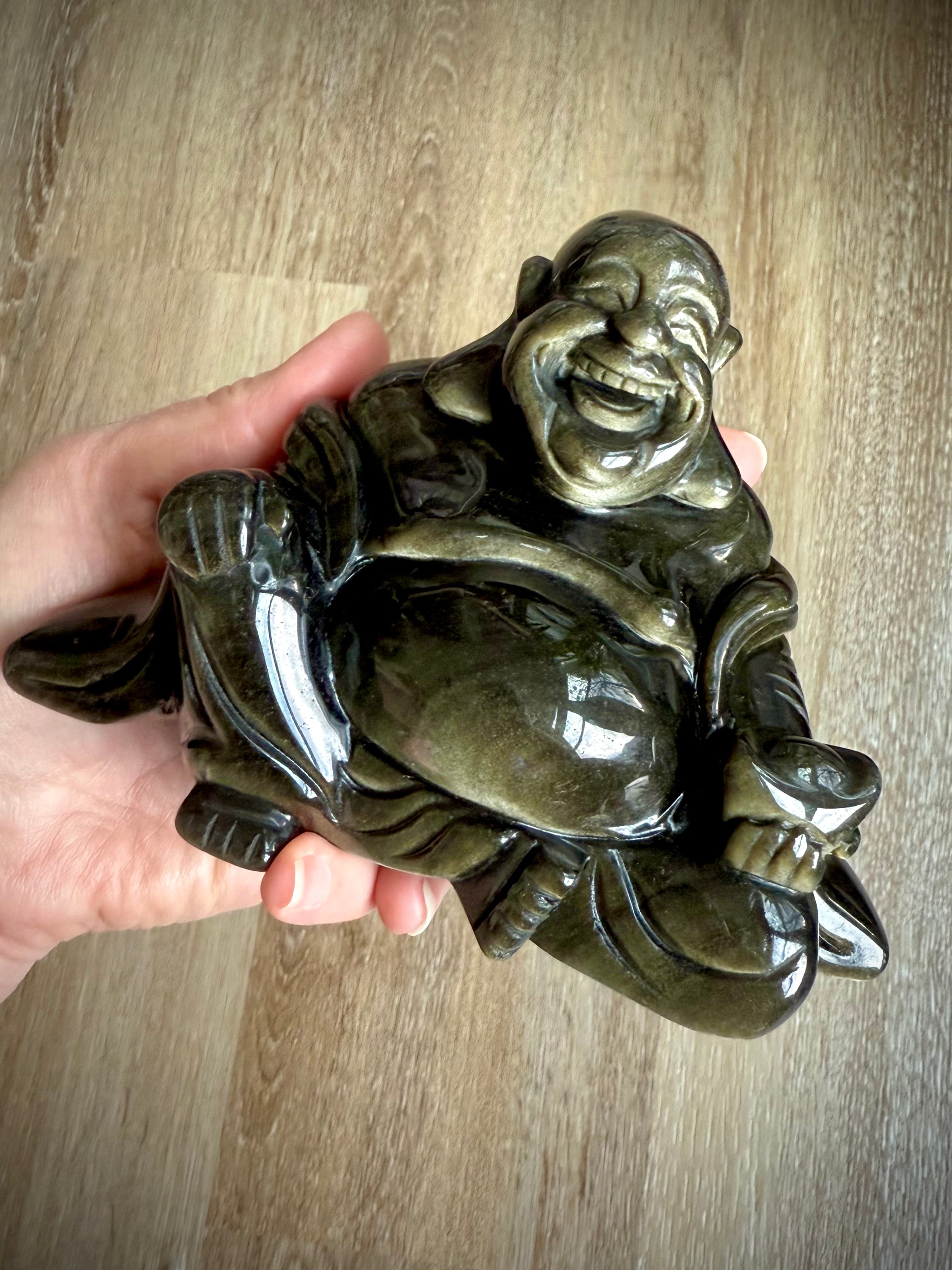 Shimmering Golden Sheen Obsidian Happy Buddha carving held in palm – crystal figurine for solar plexus chakra and energetic protection