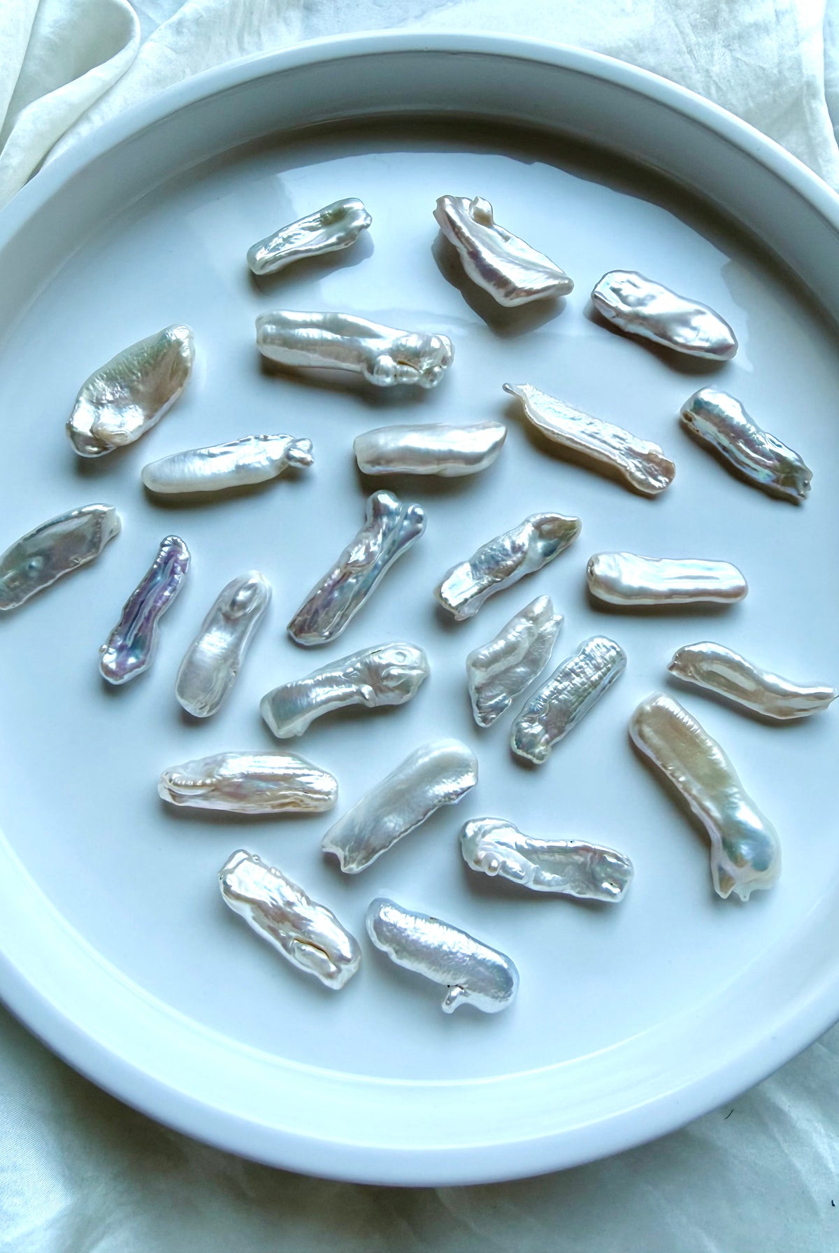 Baroque Stick Pearls with high-luster white nacre, iridescent color and naturally varied shapes