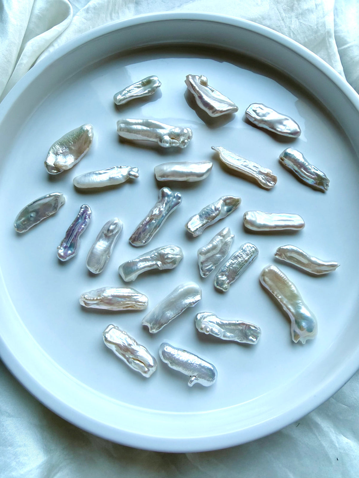 Baroque Stick Pearls with high-luster white nacre, iridescent color and naturally varied shapes