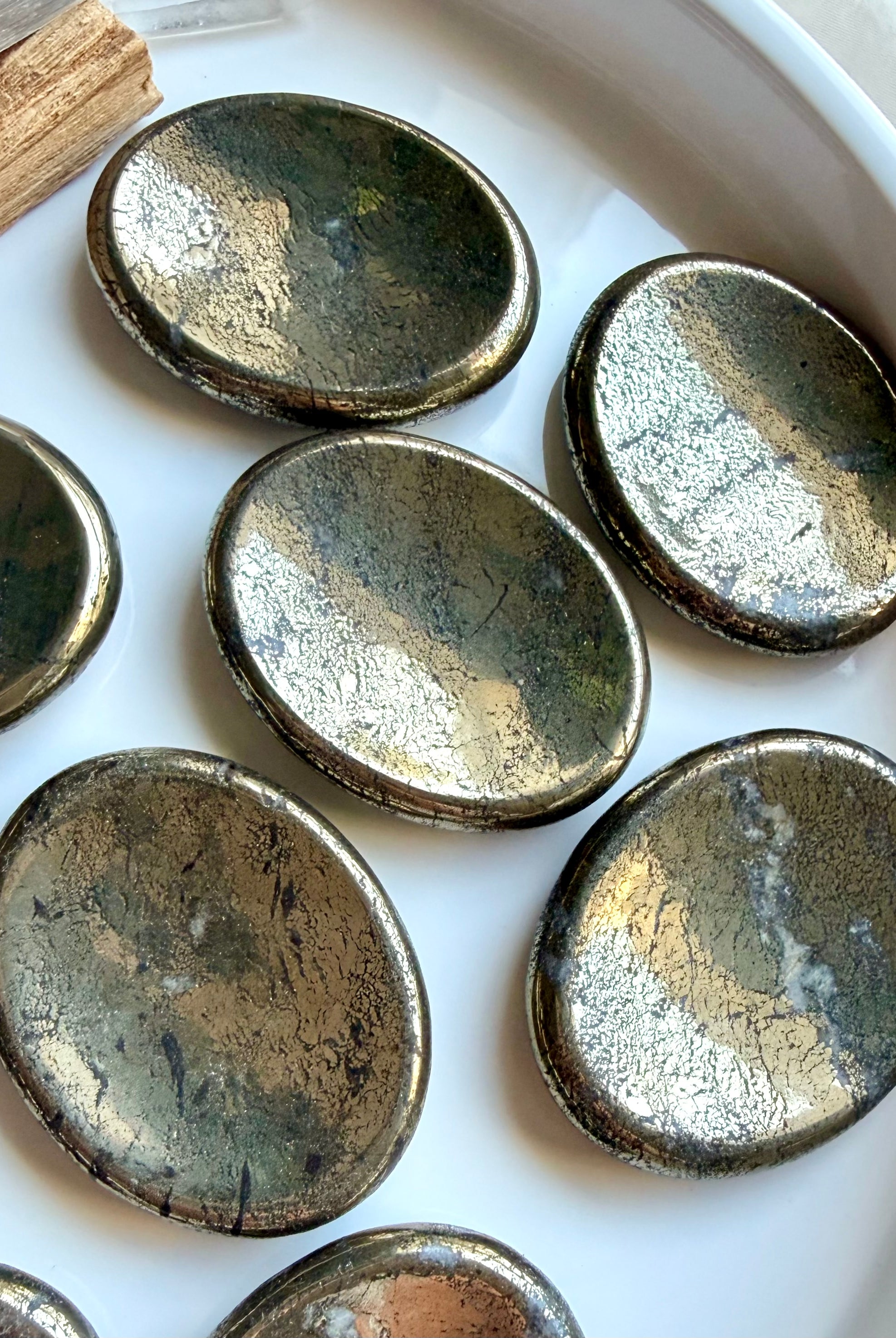 Natural Pyrite worry stones with gold and bronze metallic sheen for abundance, manifestation and protection