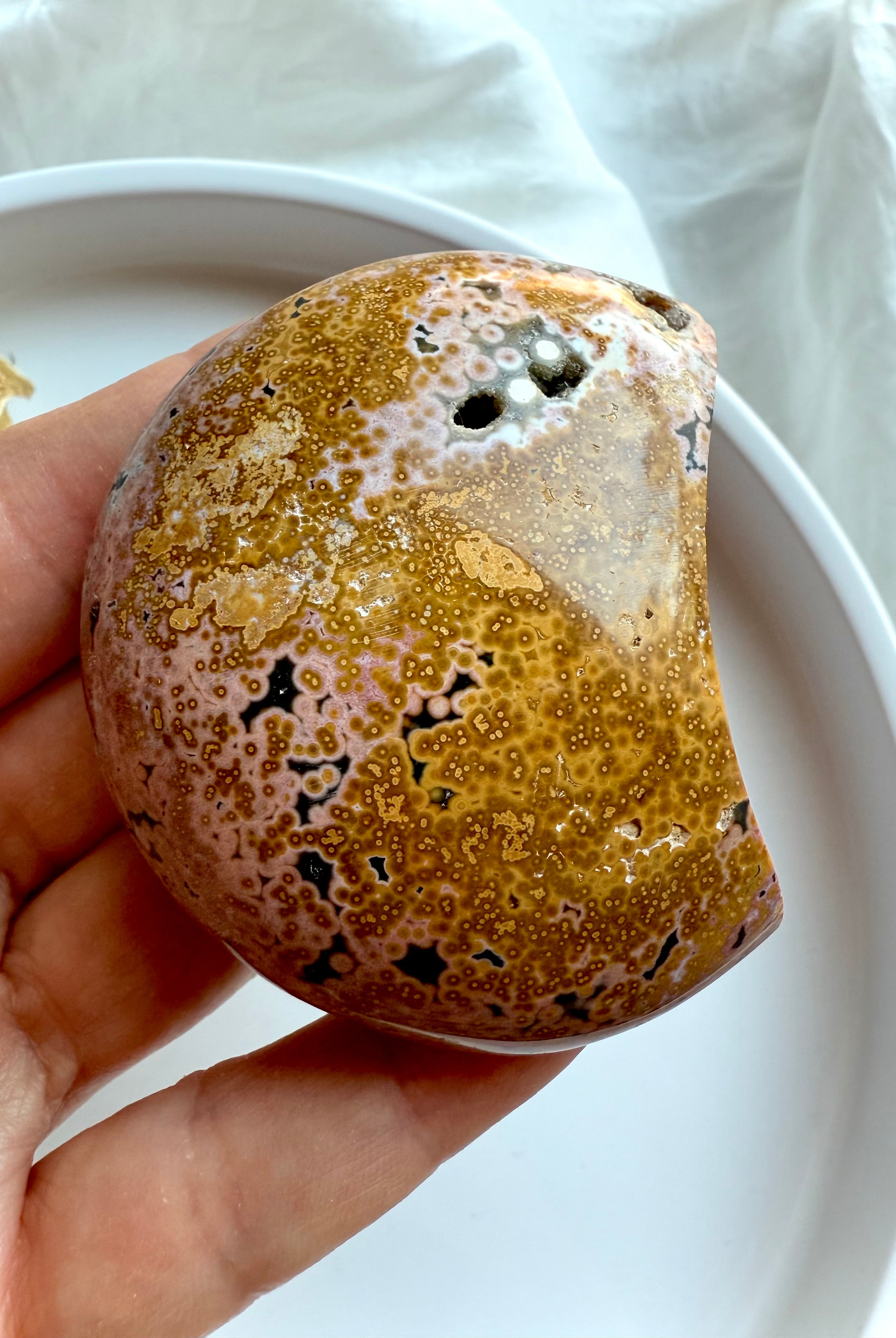 Peach and yellow Ocean Jasper moon stone showing detailed orbicular formations for grounding and emotional balance