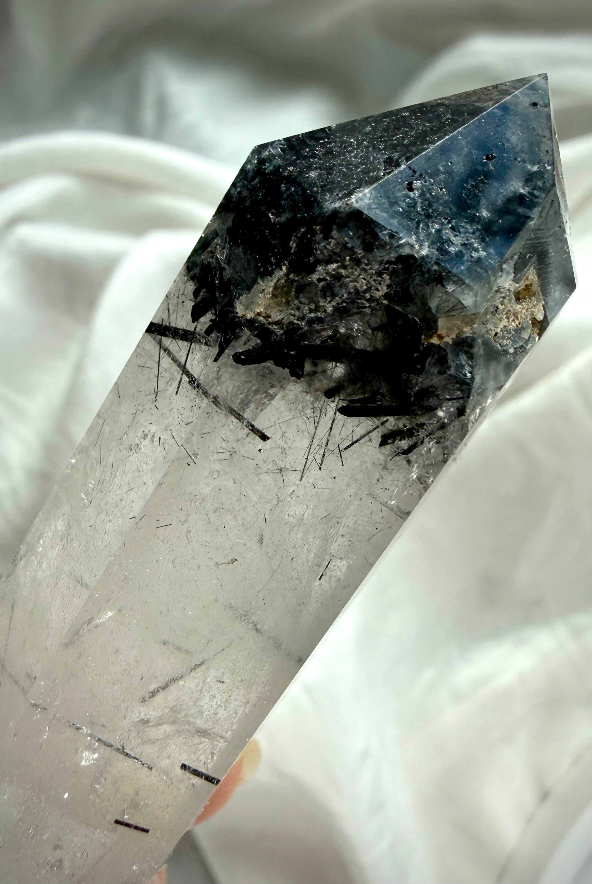 double terminated quartz crystal with black tourmaline needles and natural mineral texture