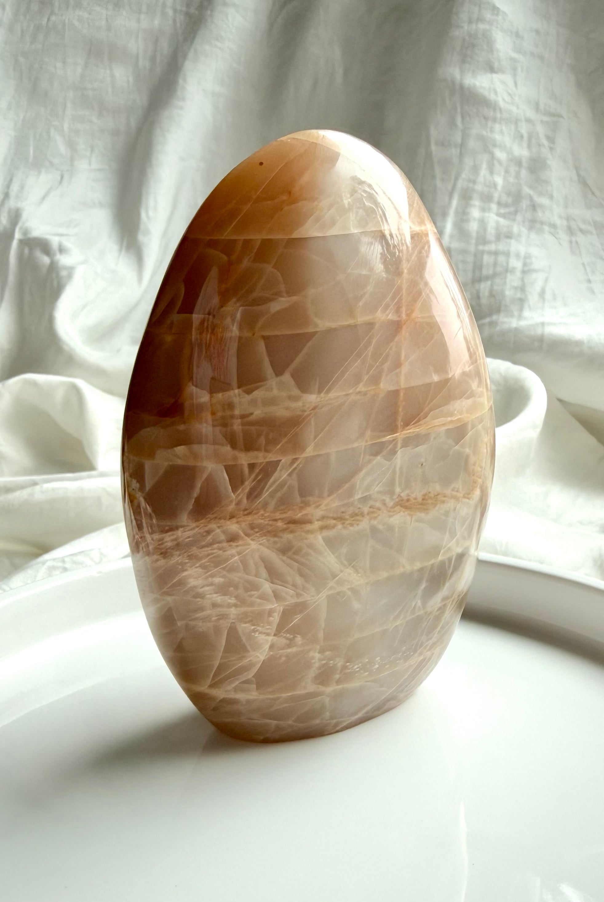Large Peach Moonstone crystal freeform with luminous shimmer and soft neutral tones from Madagascar