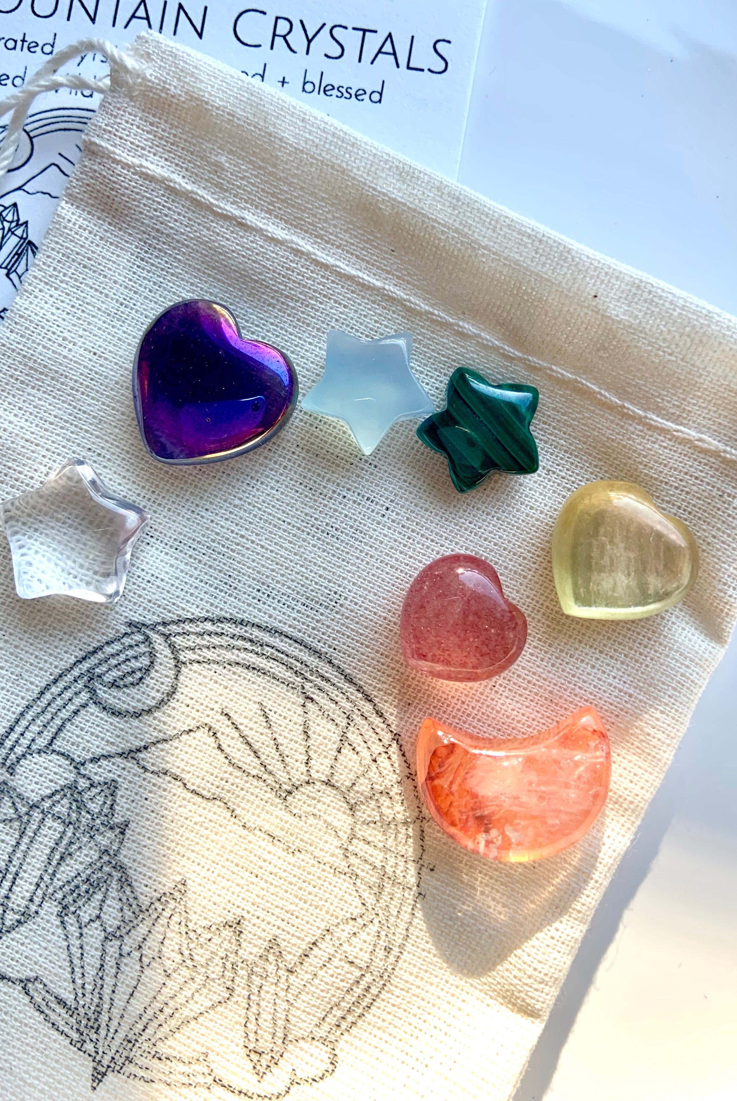 Premium chakra crystal set of 7 mini carved gems in high-vibe rainbow heart, moon & star shapes