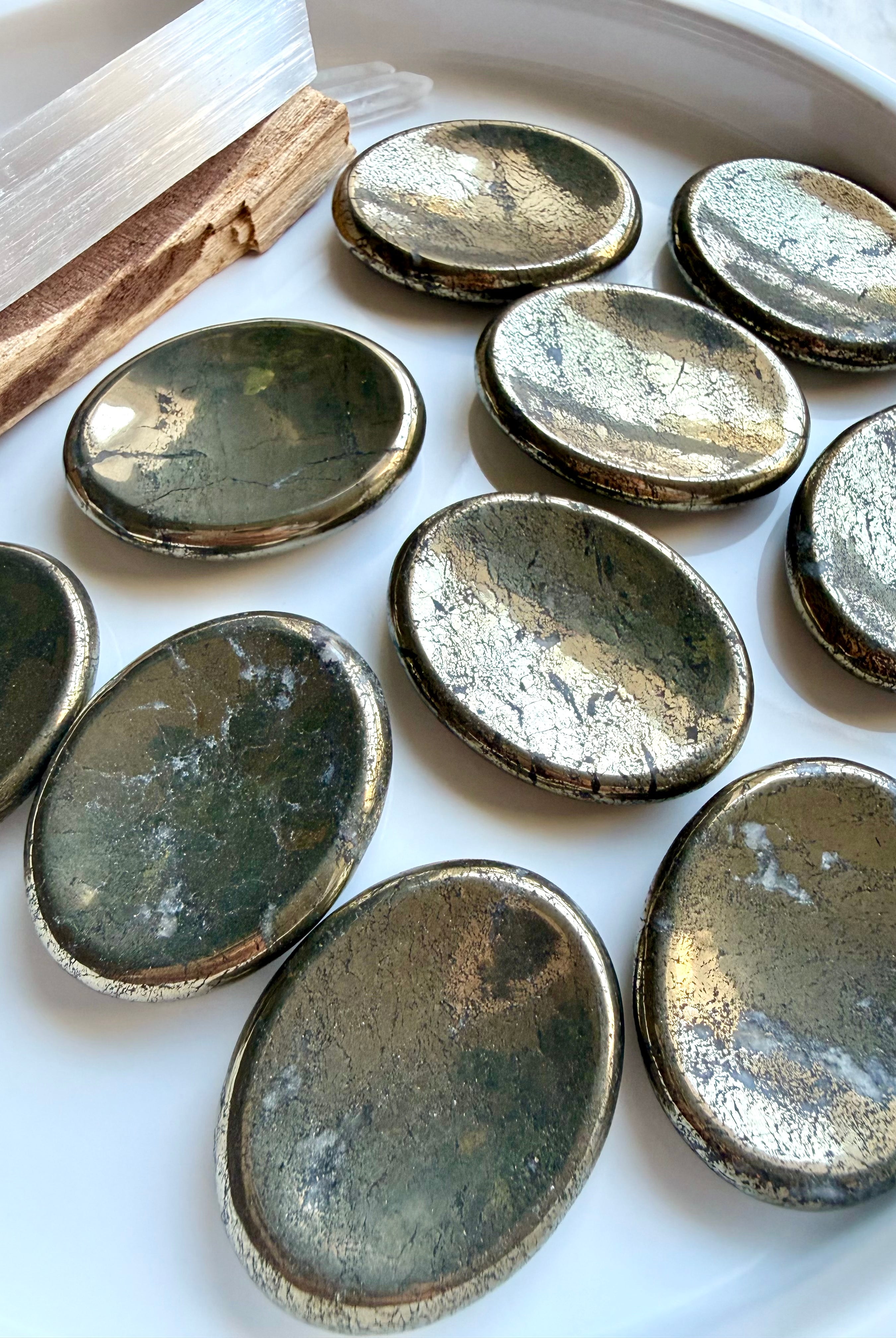 Pyrite worry stones with brilliant metallic gold luster and natural mineral inclusions for abundance and confidence