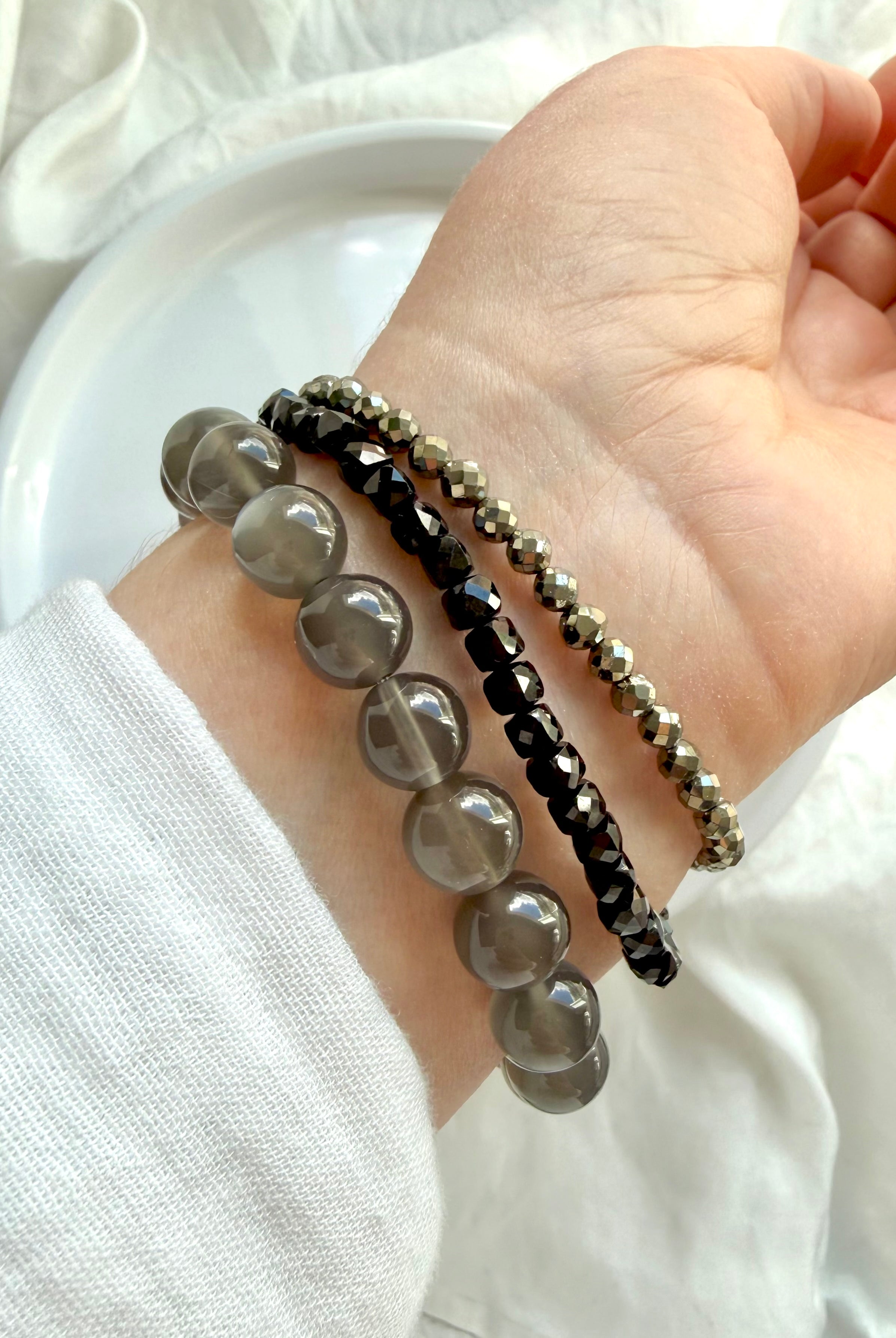 Black Moonstone bracelet layered with Black Spinel and Pyrite crystal bracelets